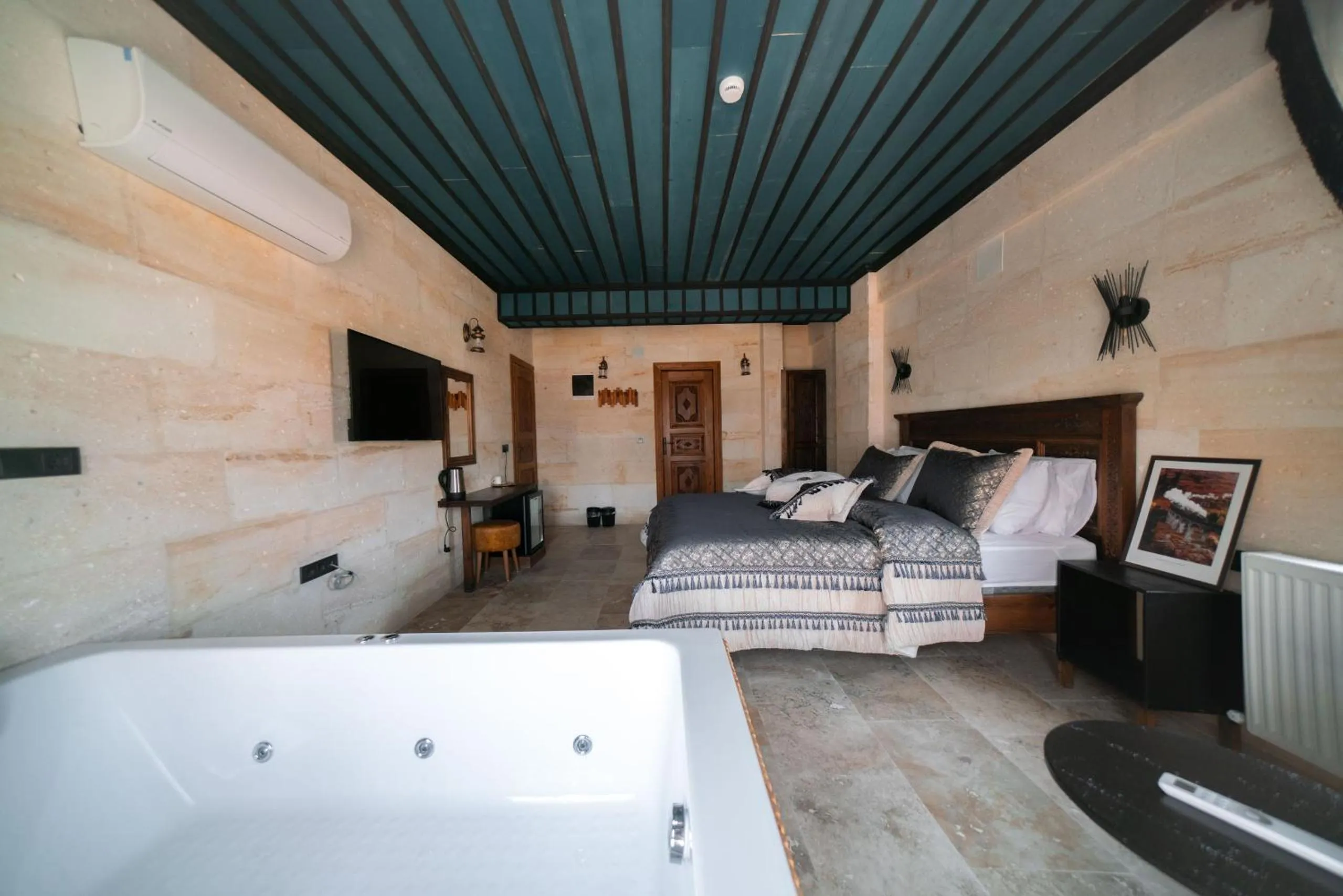 Bed in Abra Stone House