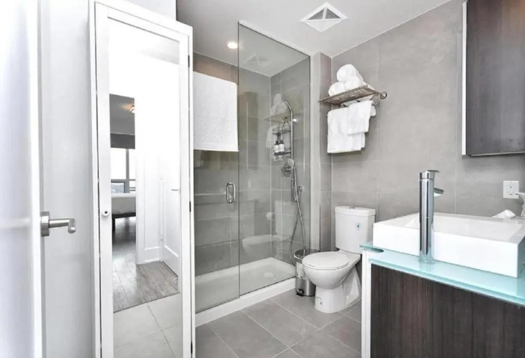 Bathroom in Skyline Suites - Walk to MTCC, ACC, Rogers Centre & Entertainment District