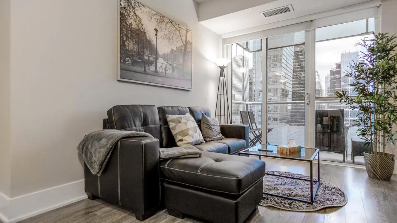 Living room in Skyline Suites - Walk to MTCC, ACC, Rogers Centre & Entertainment District