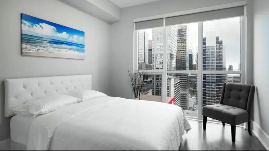 Bed in Skyline Suites - Walk to MTCC, ACC, Rogers Centre & Entertainment District