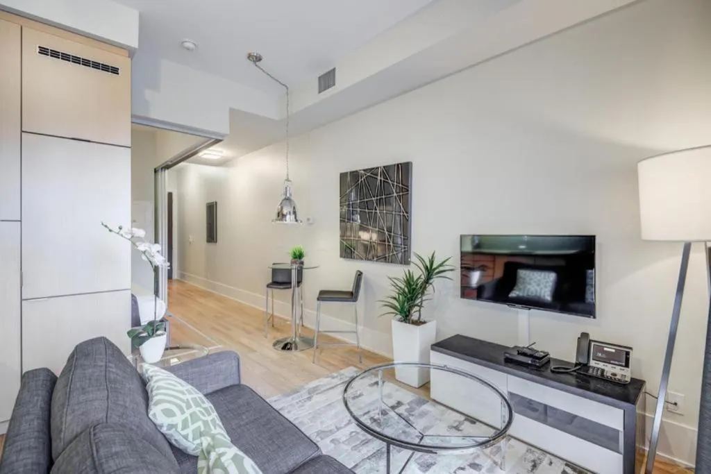 Living room in Skyline Suites - Walk to MTCC, ACC, Rogers Centre & Entertainment District