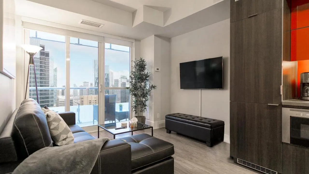 Living room in Skyline Suites - Walk to MTCC, ACC, Rogers Centre & Entertainment District