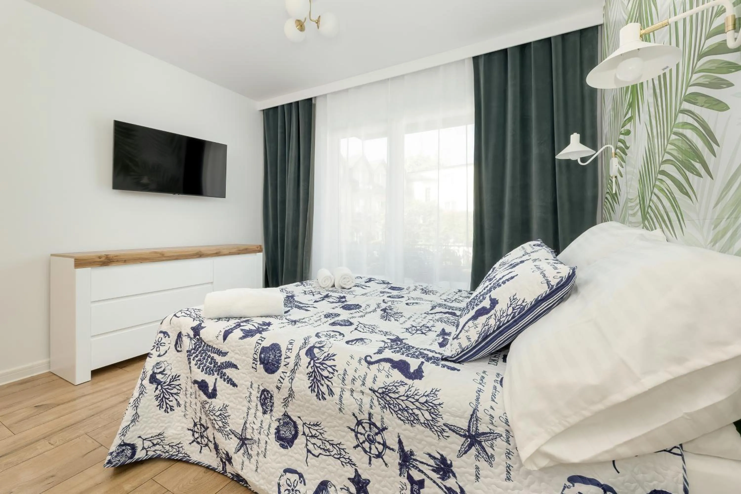 Bed in Akwamaryn Apartamenty