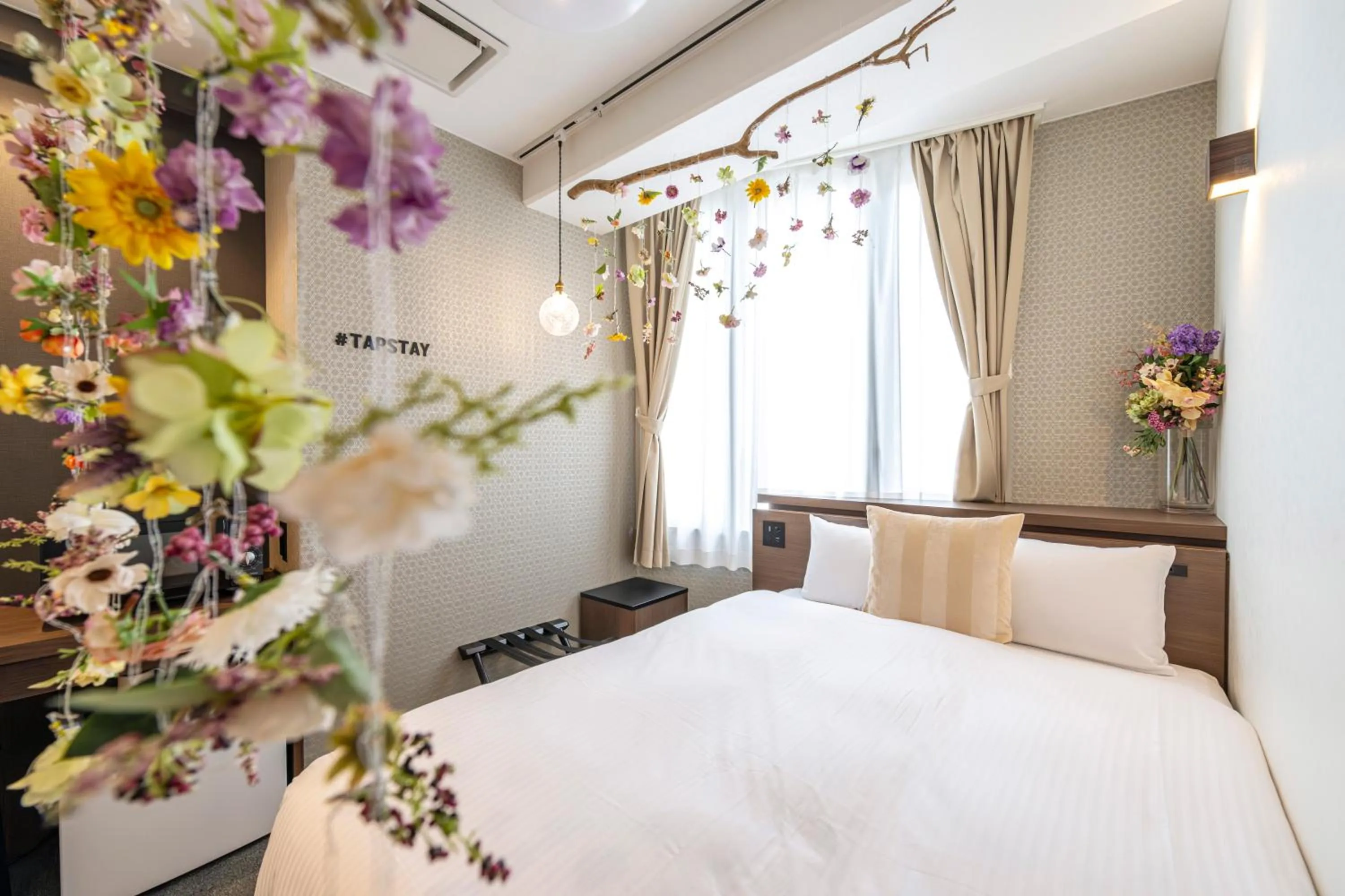 Bed in TapStay Hotel