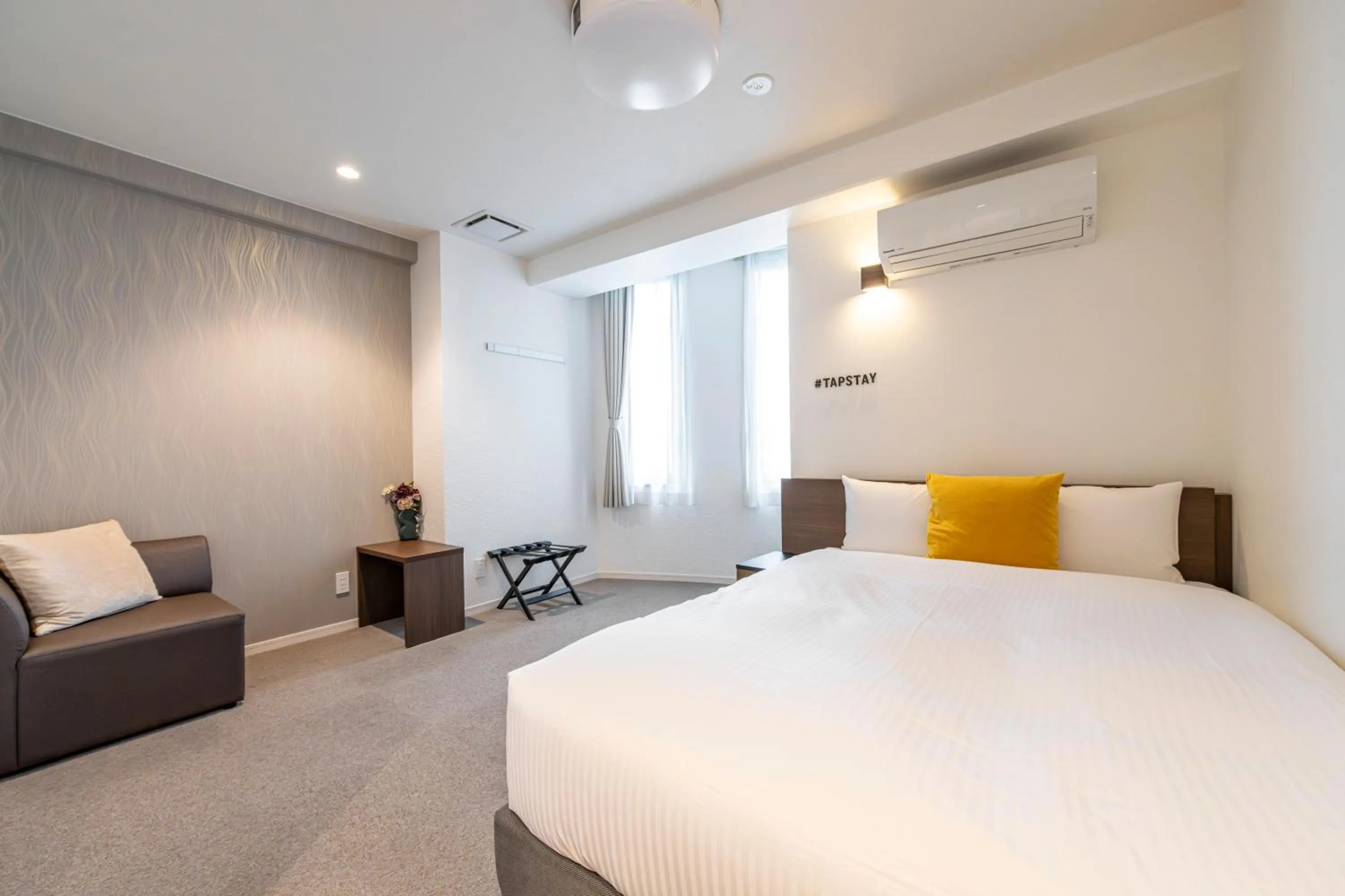 Bed in TapStay Hotel