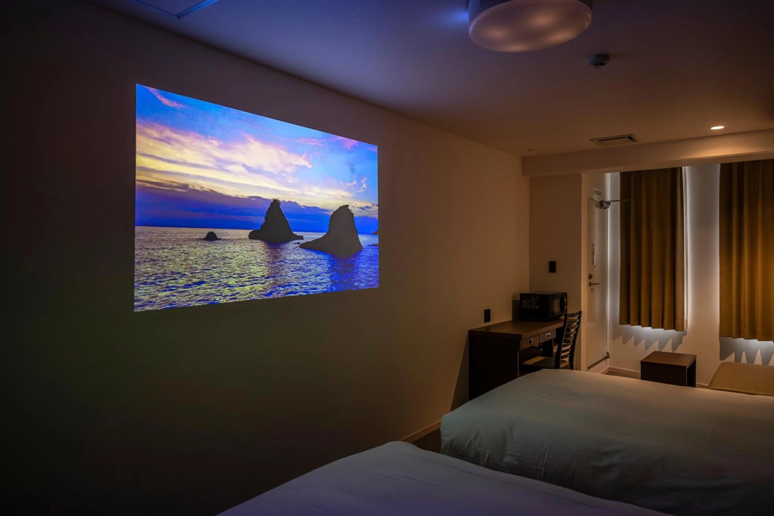 Bed in TapStay Hotel