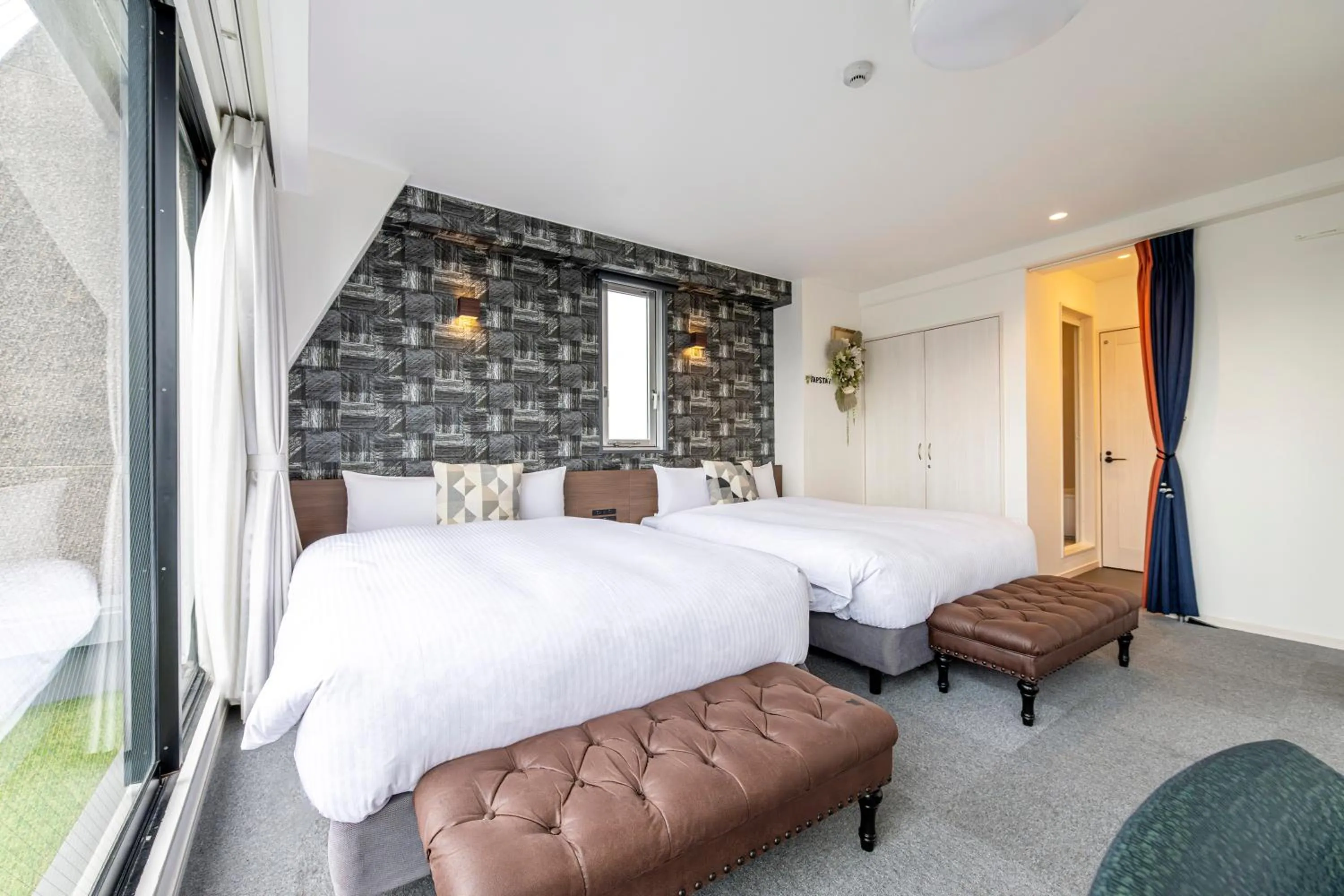 Bed in TapStay Hotel