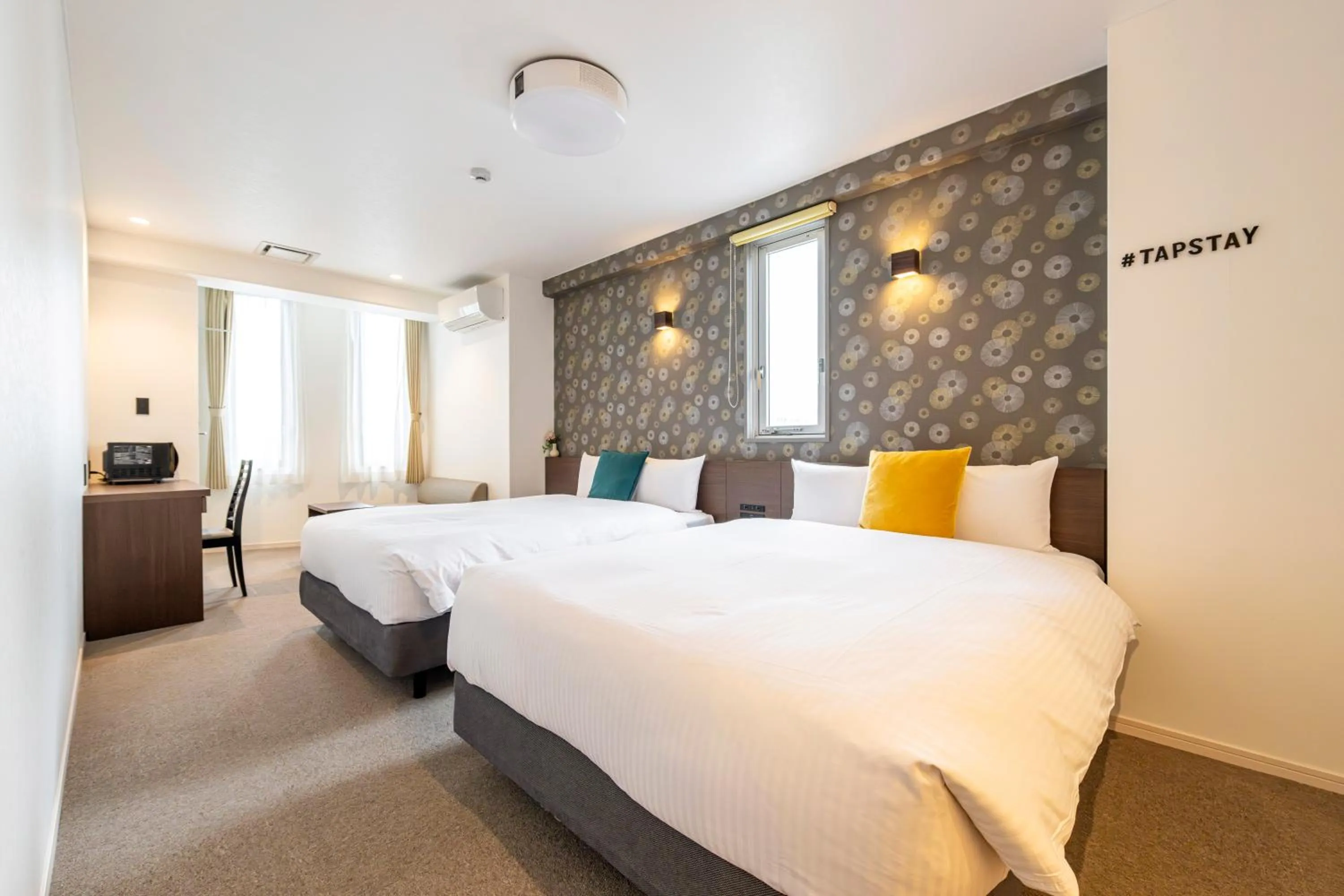 Bed in TapStay Hotel