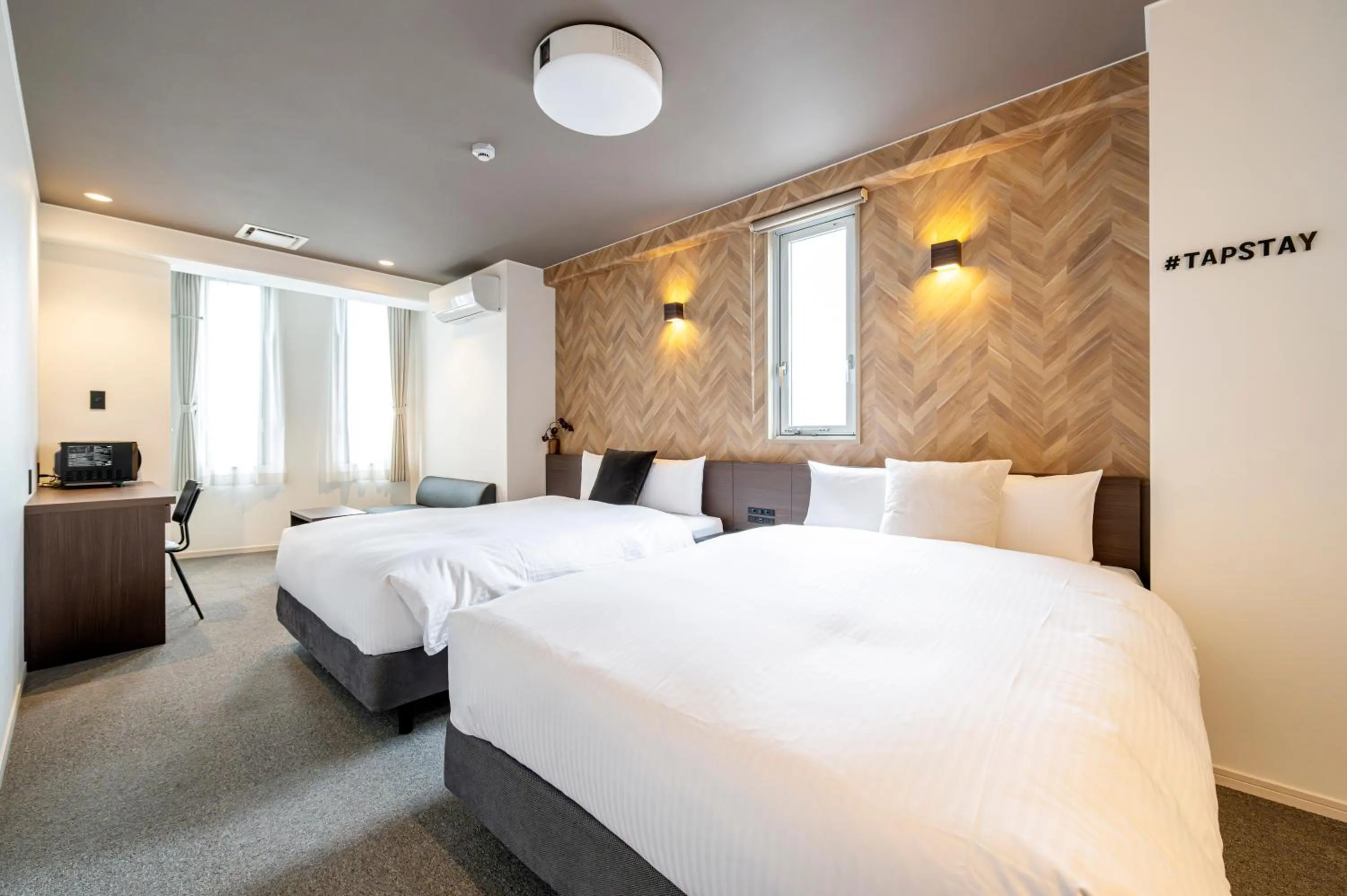 Bed in TapStay Hotel