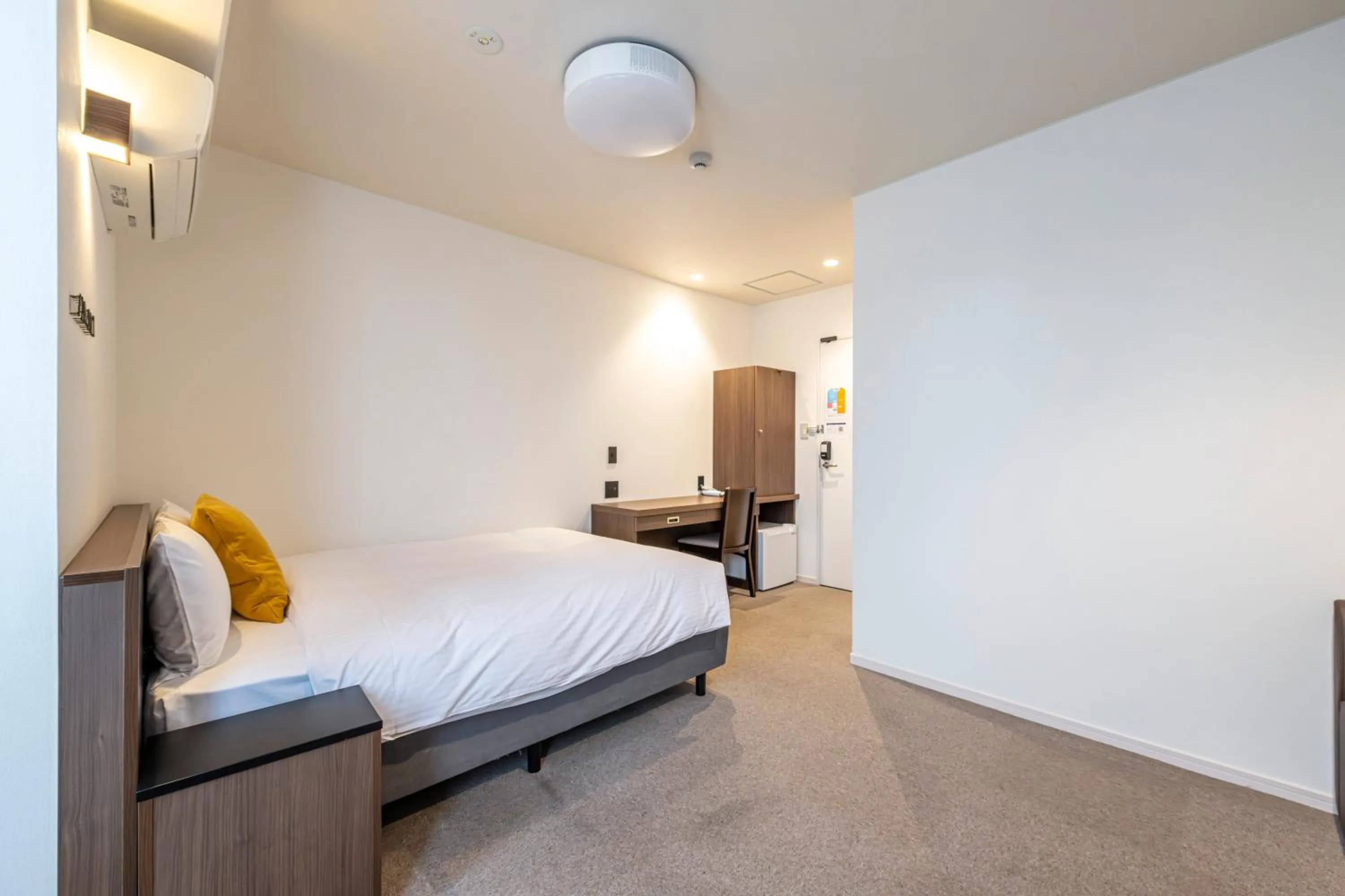 Bed in TapStay Hotel