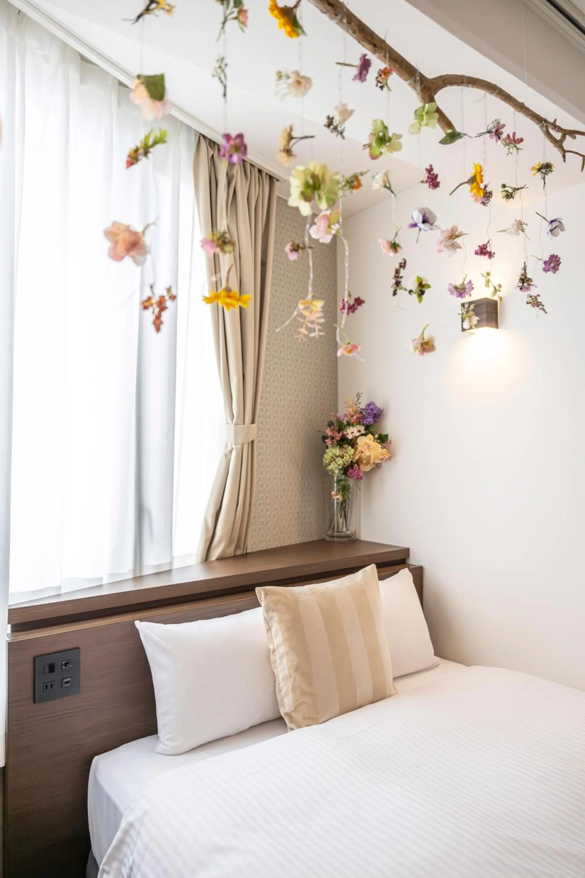 Bed in TapStay Hotel