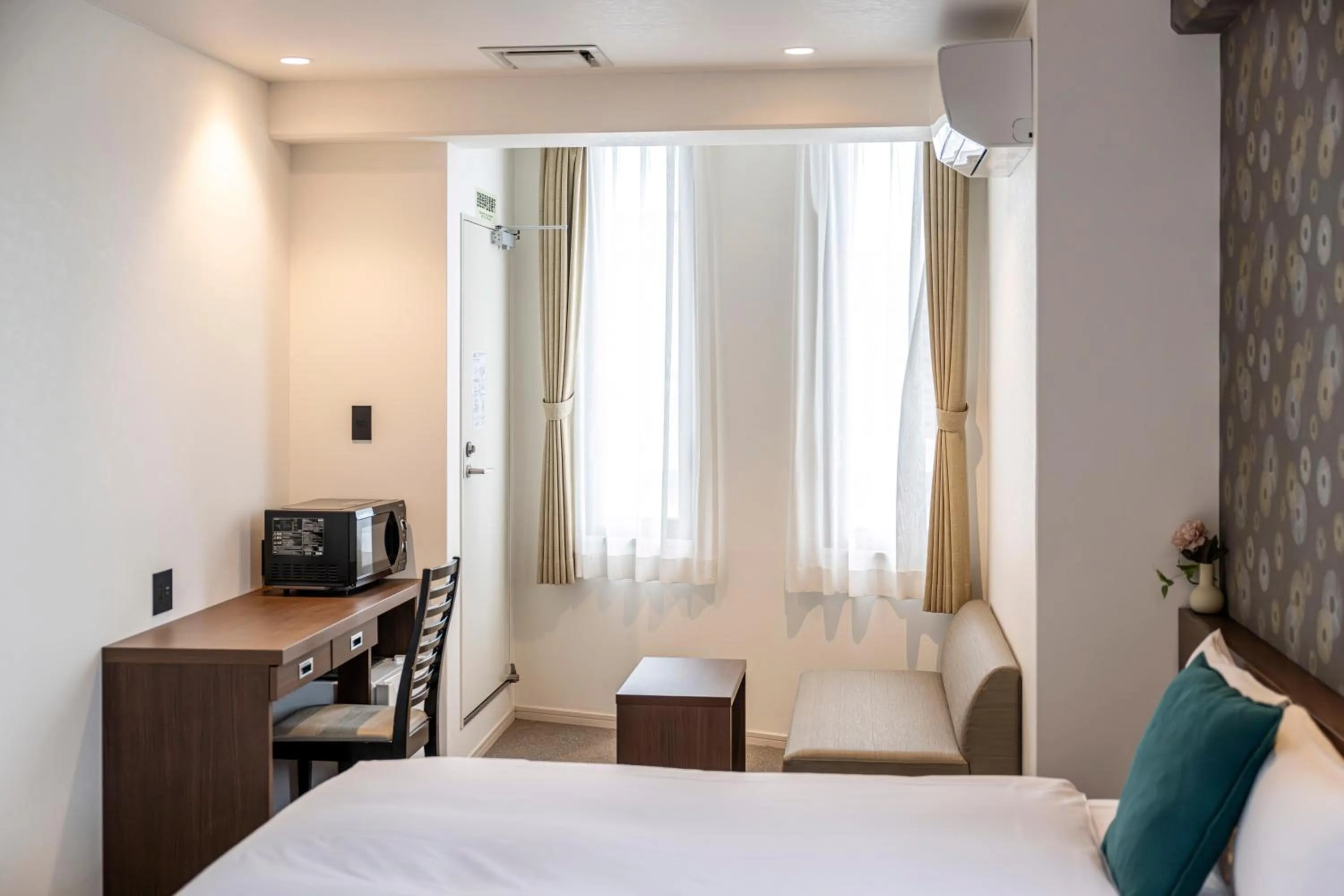 Bed in TapStay Hotel