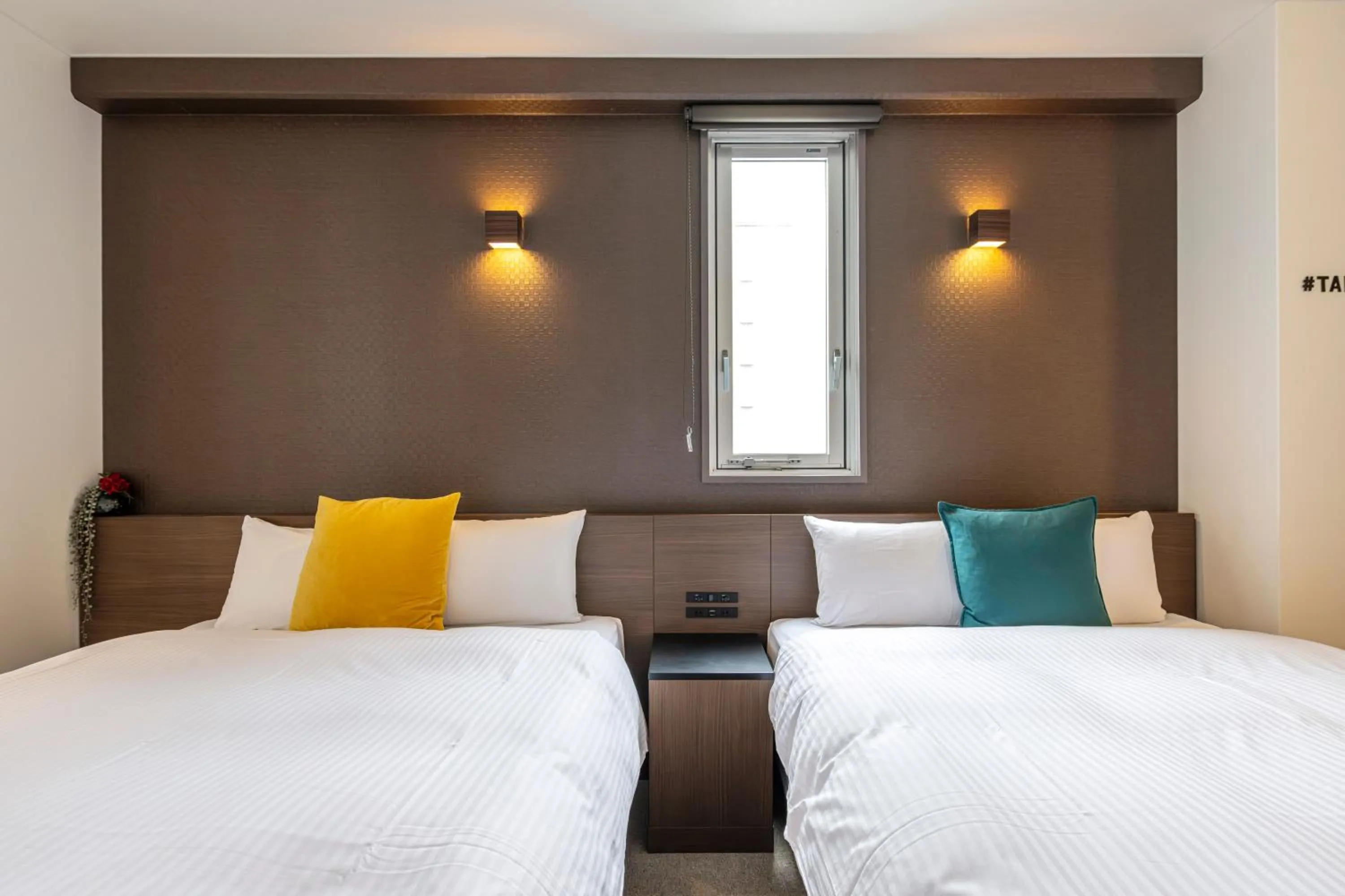 Bed in TapStay Hotel