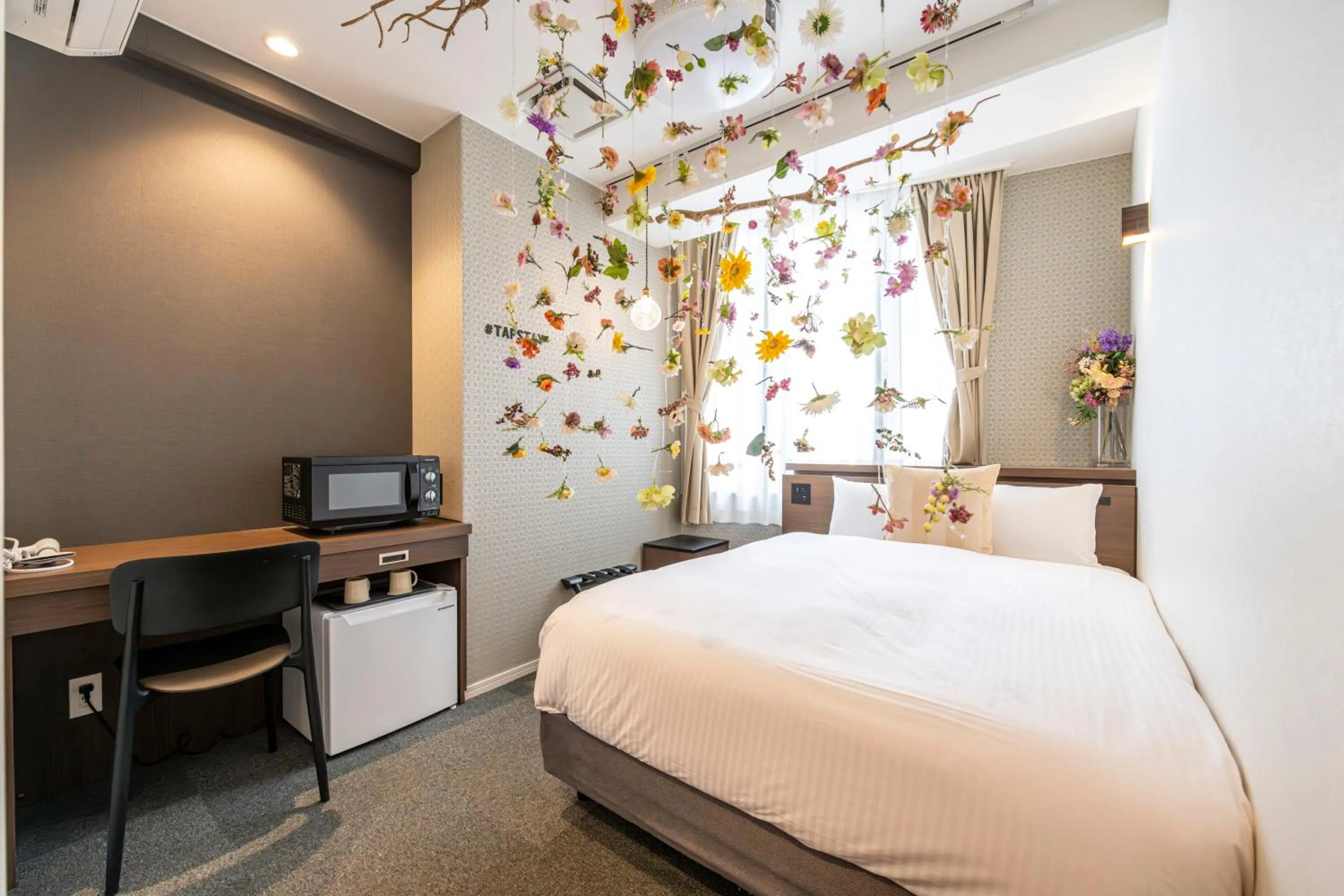 Bed in TapStay Hotel