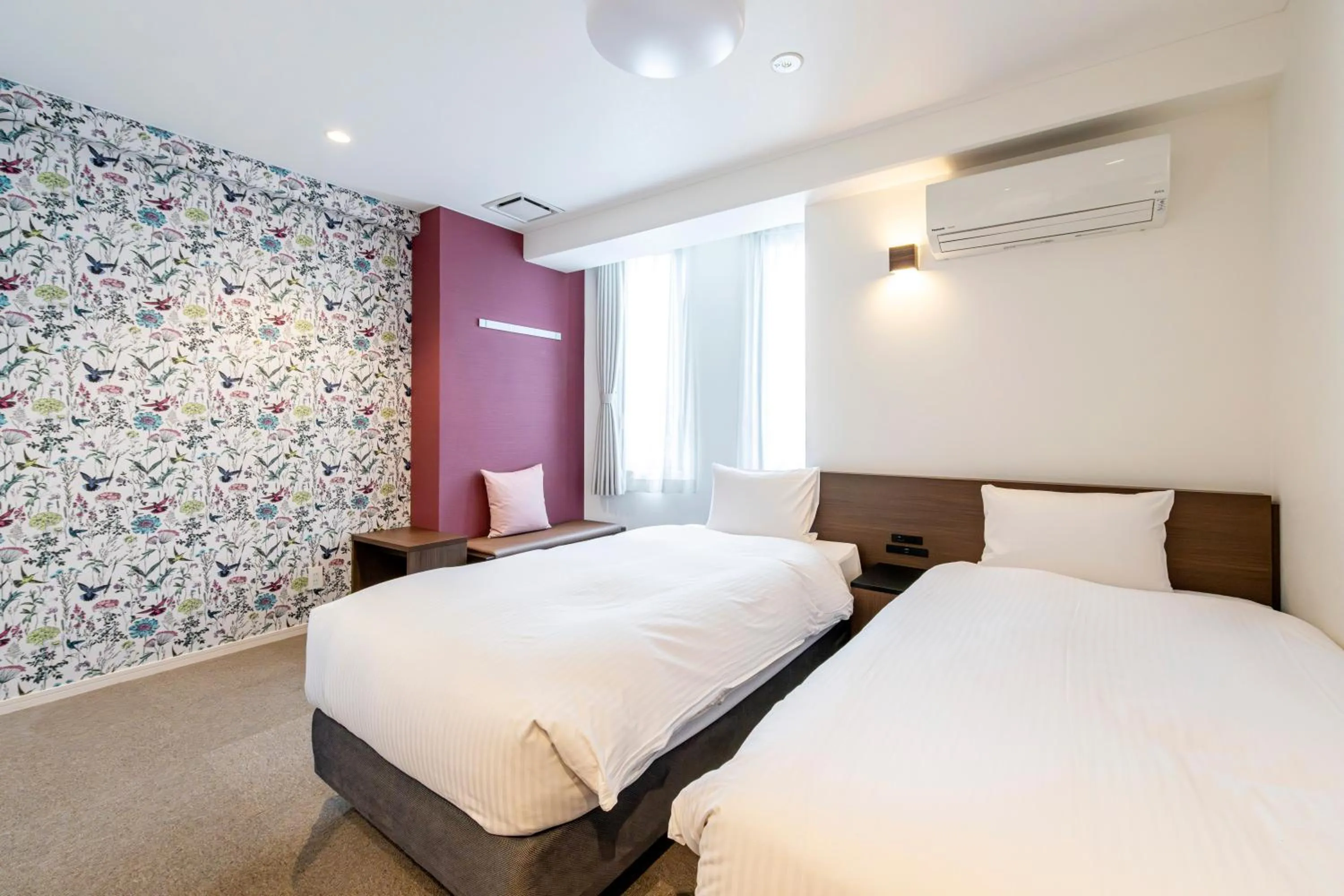 Bed in TapStay Hotel