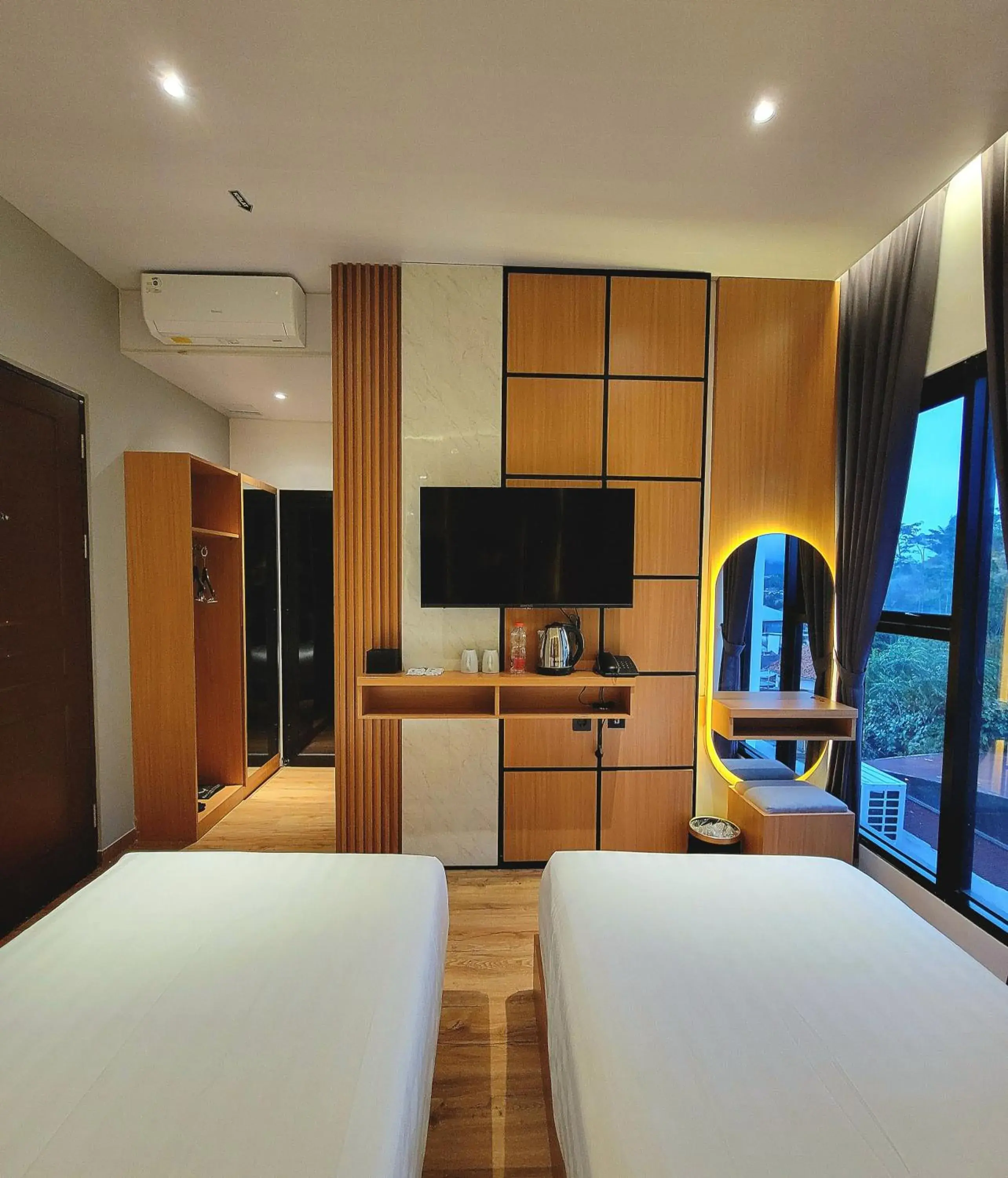 TV and multimedia, Bed in Eagle Hotel Wonosobo, Azana Hotels Collection TV and multimedia, Bed in Eagle Hotel Wonosobo, Azana Hotels Collection