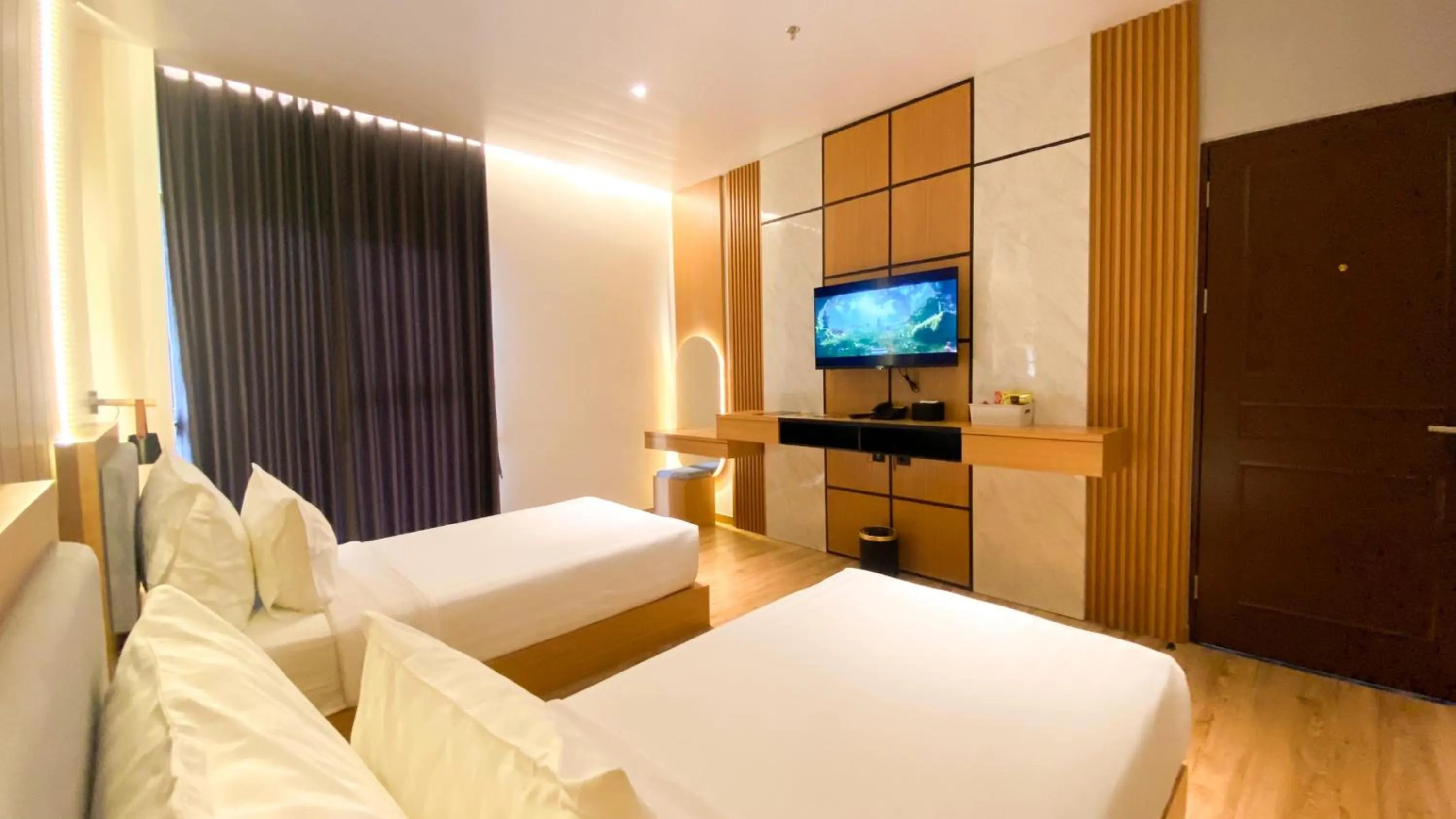 Bedroom, Bed in Eagle Hotel Wonosobo, Azana Hotels Collection
