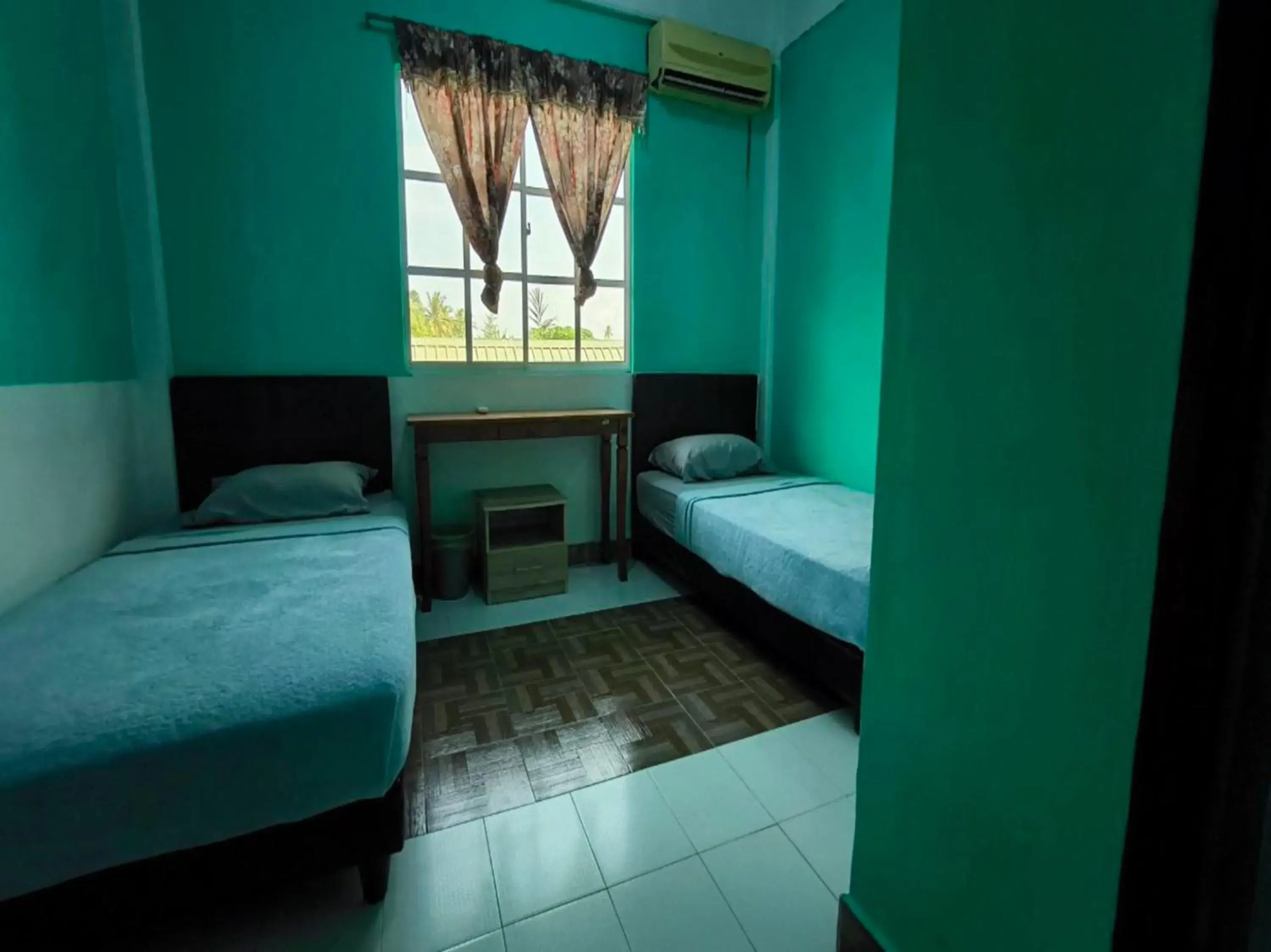 Bedroom in OYO 91012 Cenang Motel Bedroom in OYO 91012 Cenang Motel