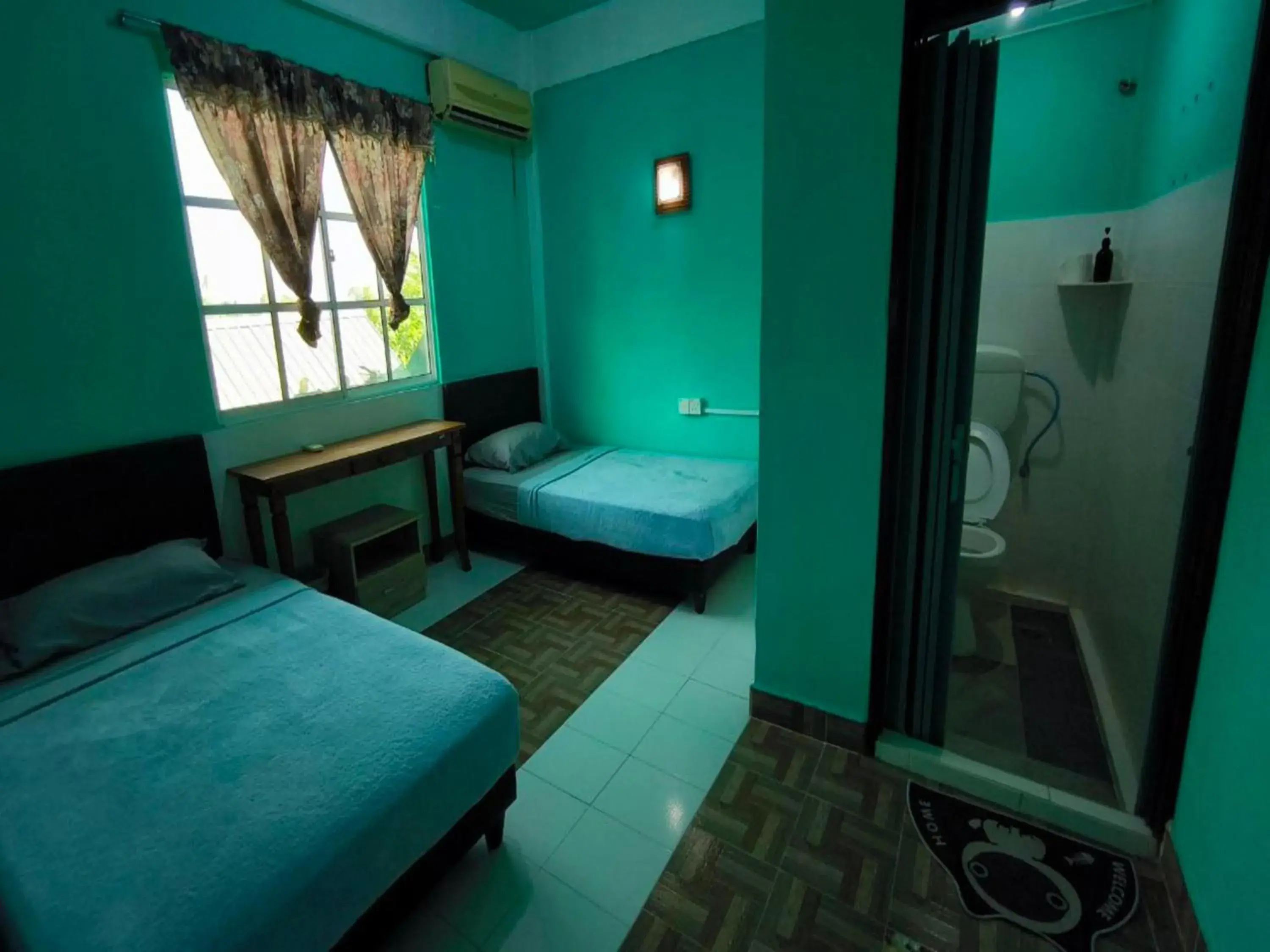 Bedroom in OYO 91012 Cenang Motel Bedroom in OYO 91012 Cenang Motel