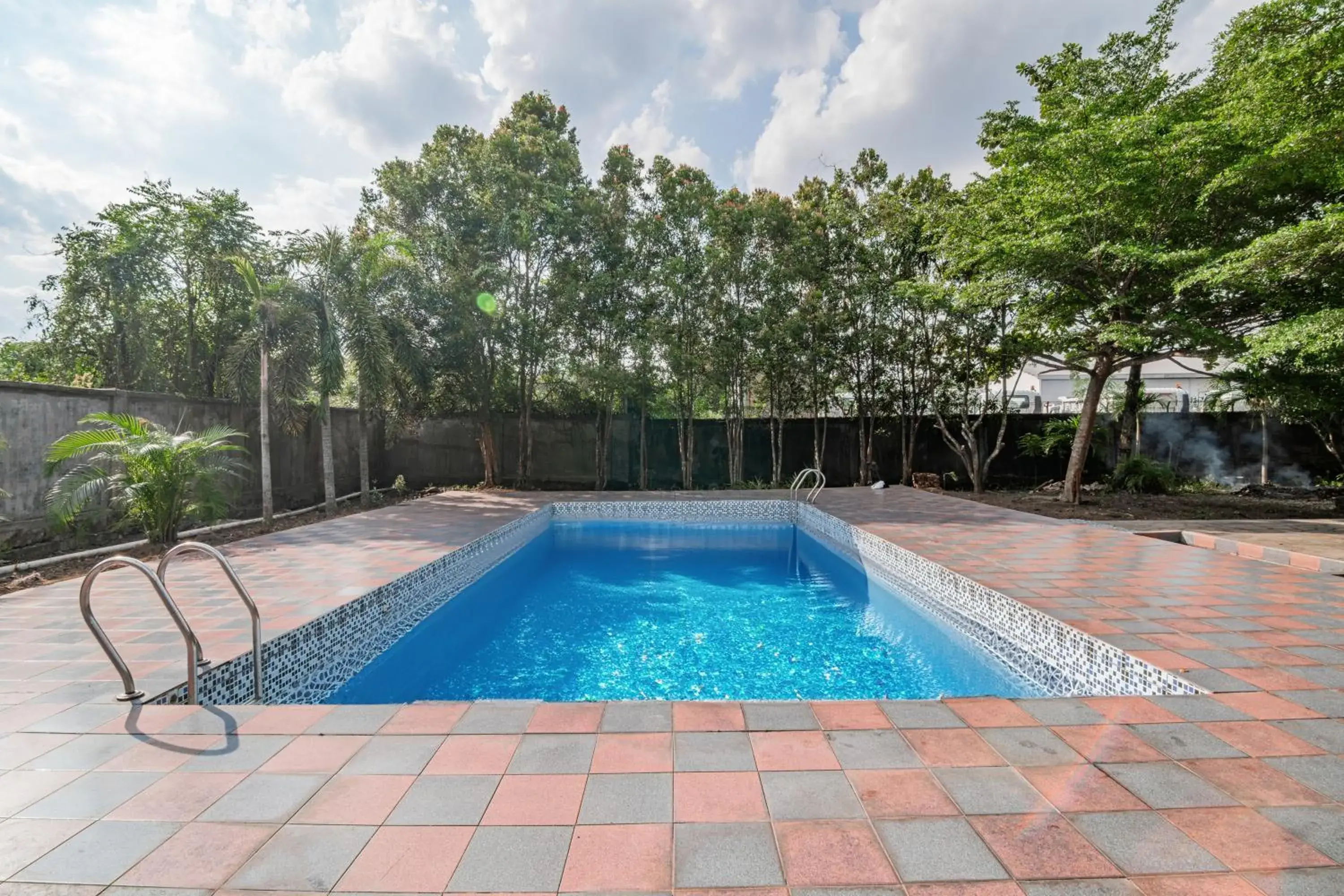 Swimming pool in Collection O Olgaria Hotel Near Living World Pekanbaru Swimming pool in Collection O Olgaria Hotel Near Living World Pekanbaru