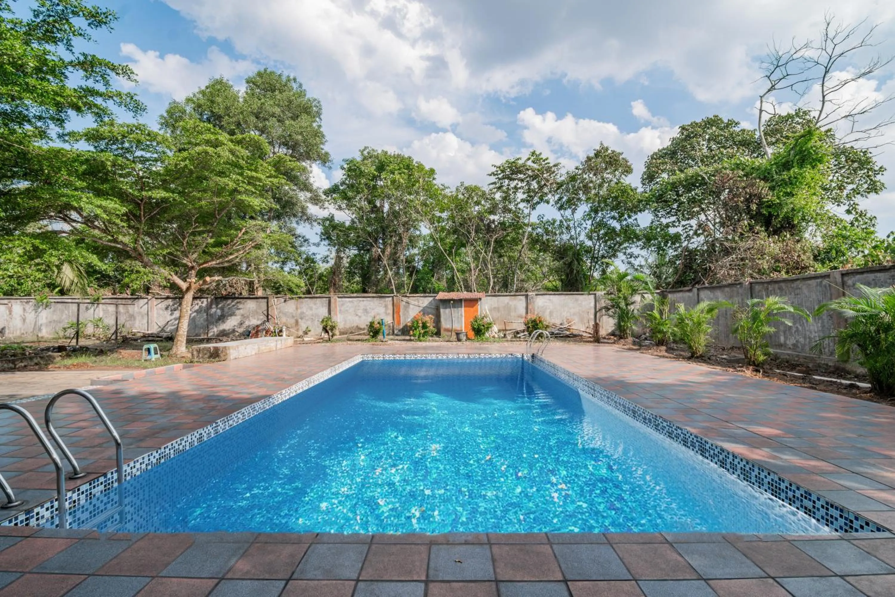 Swimming pool in Collection O Pusat Kota Pekanbaru Near Mall Ska Formerly Hotel Olgaria