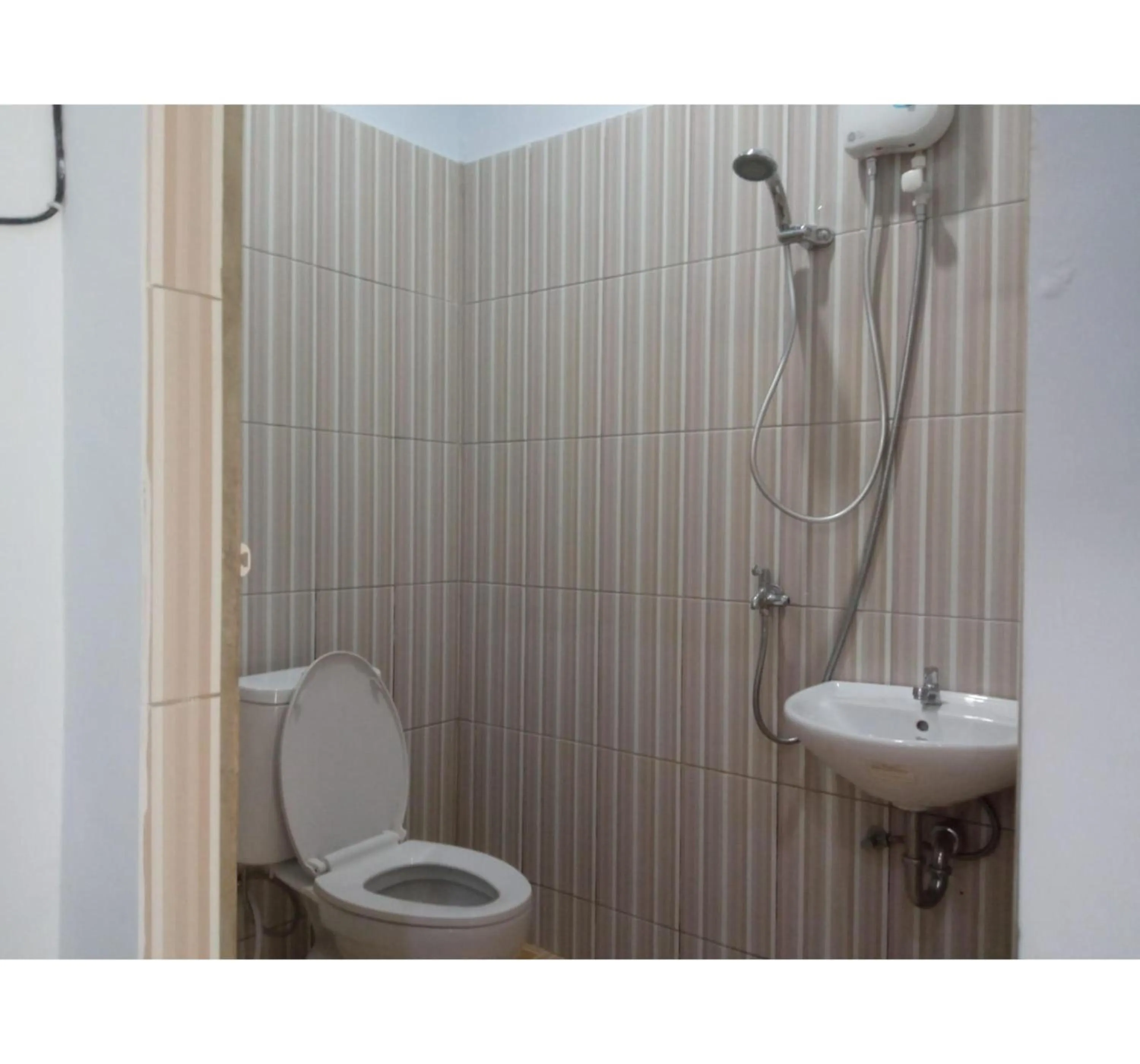 Bathroom in Hotel O Ratha Guest House Syariah