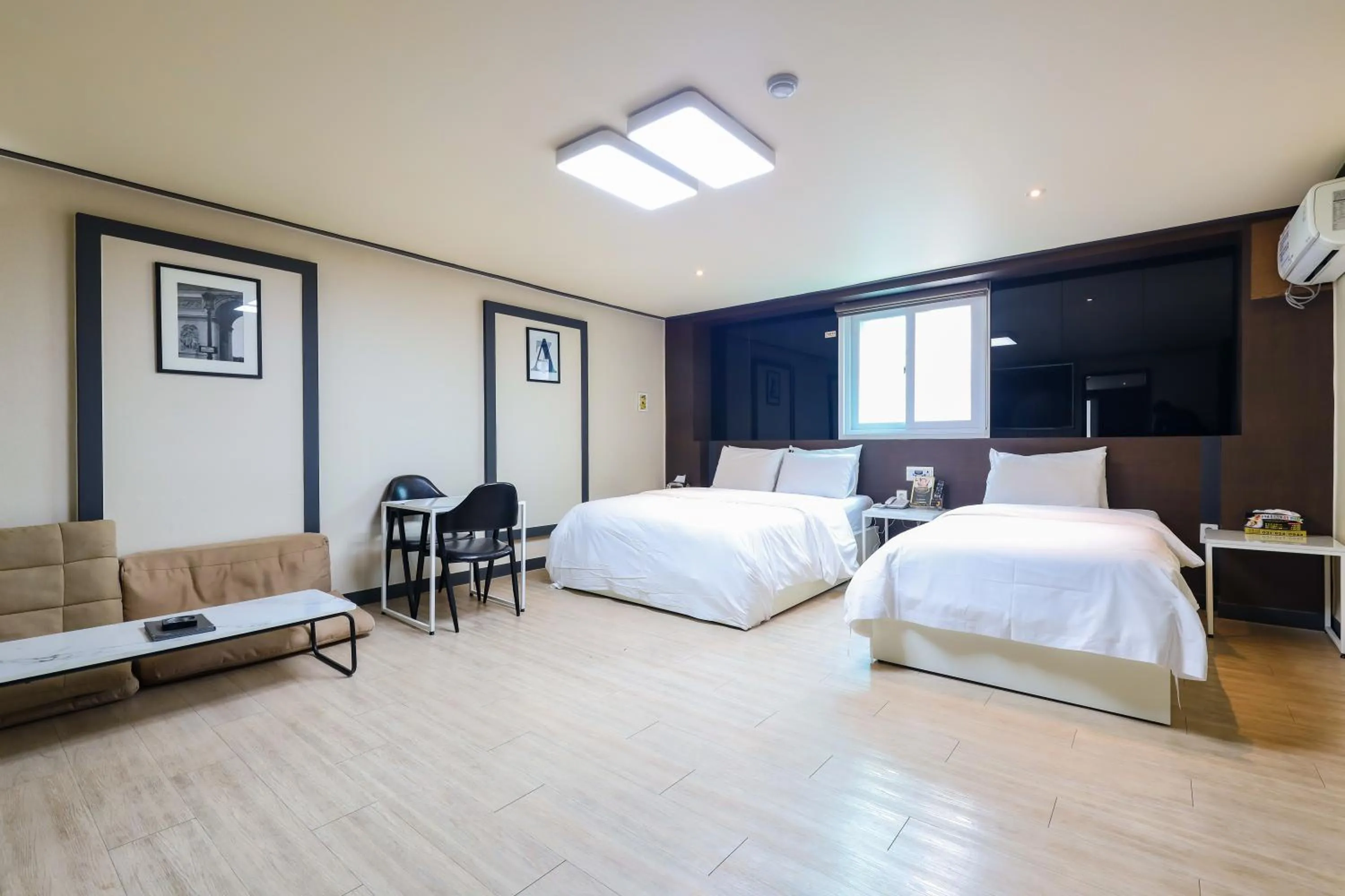 Bed in FromH J Hotel Osan