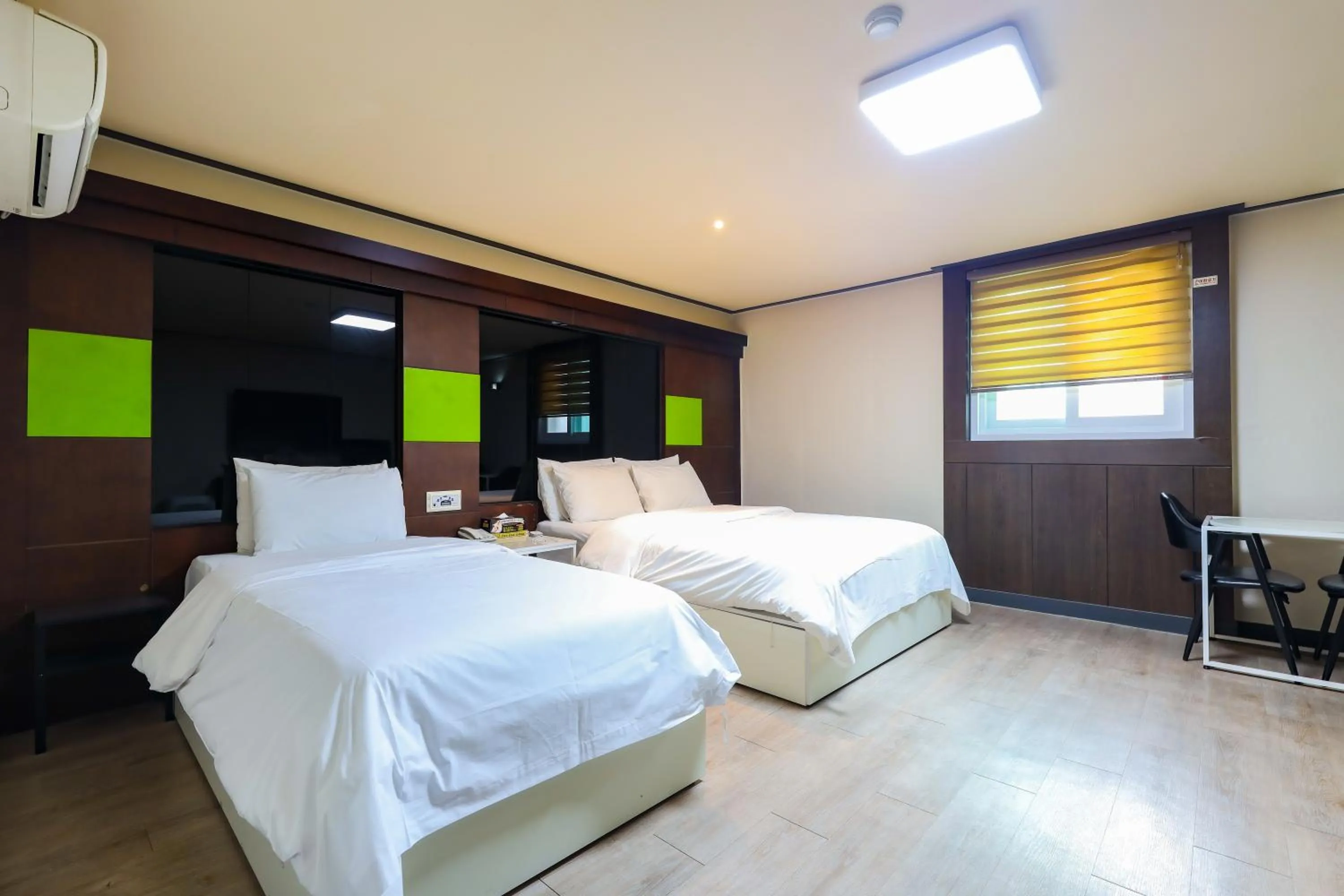 Bed in FromH J Hotel Osan