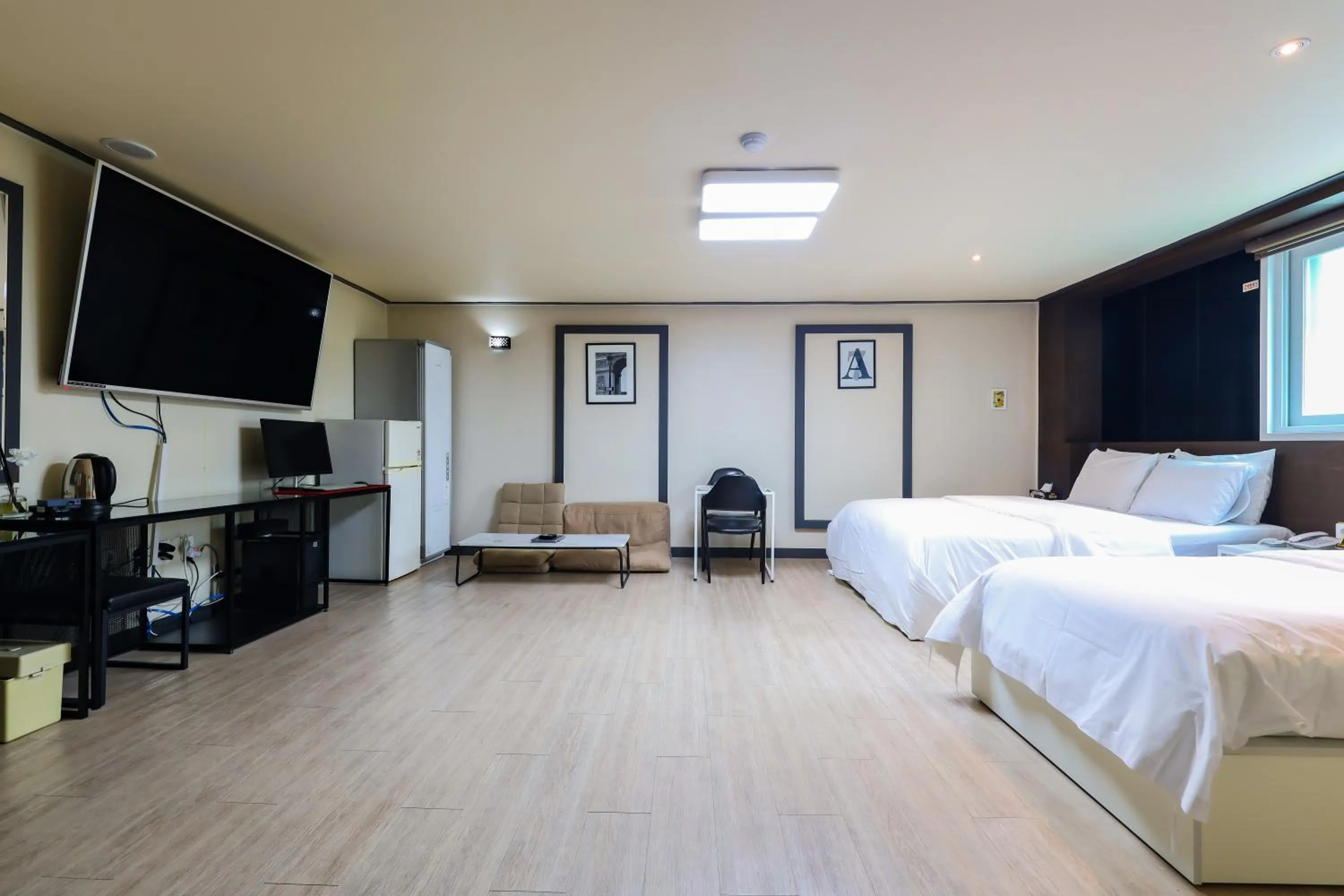 Bed in FromH J Hotel Osan