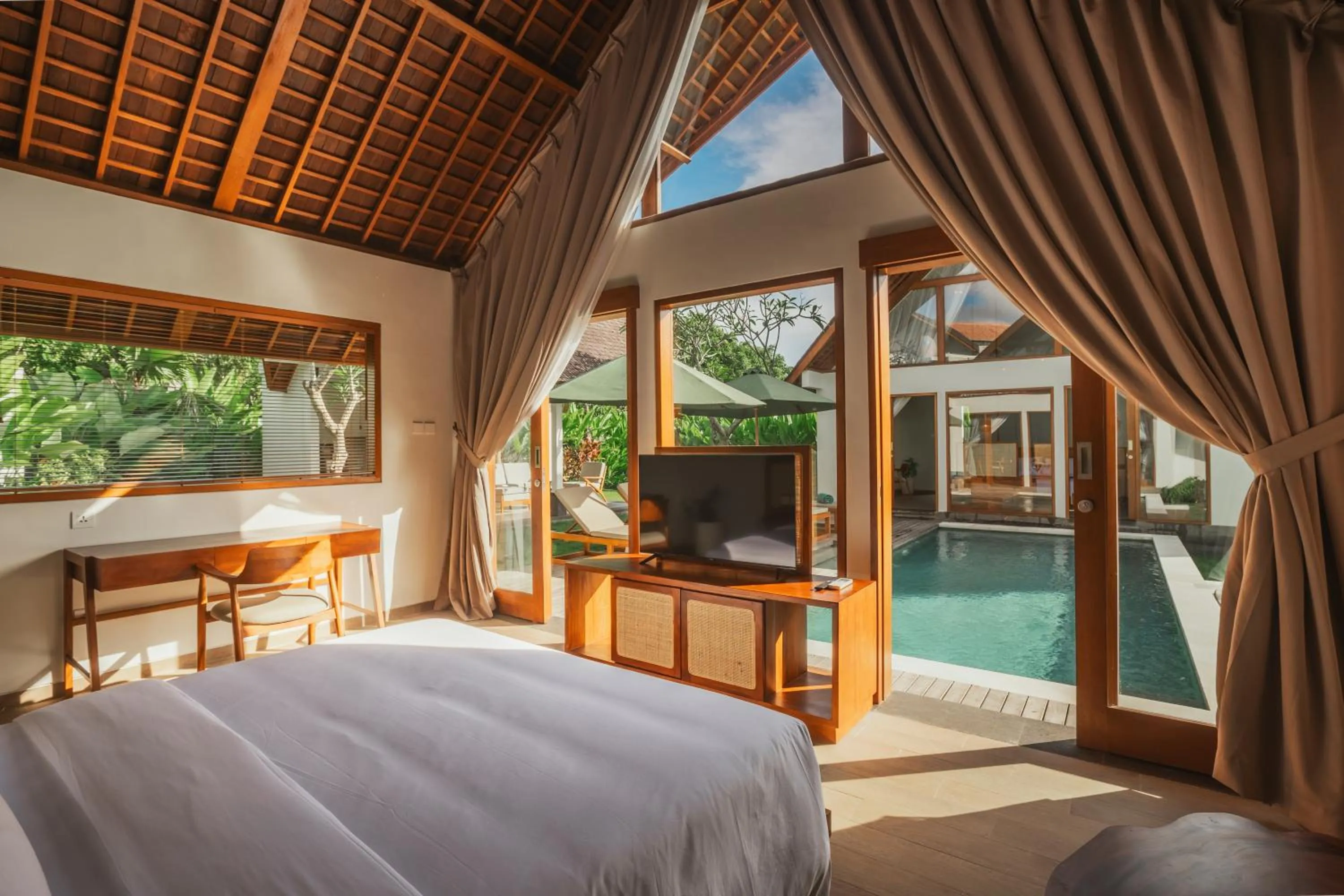 Bed in Arpana Luxury Private Pool Villas