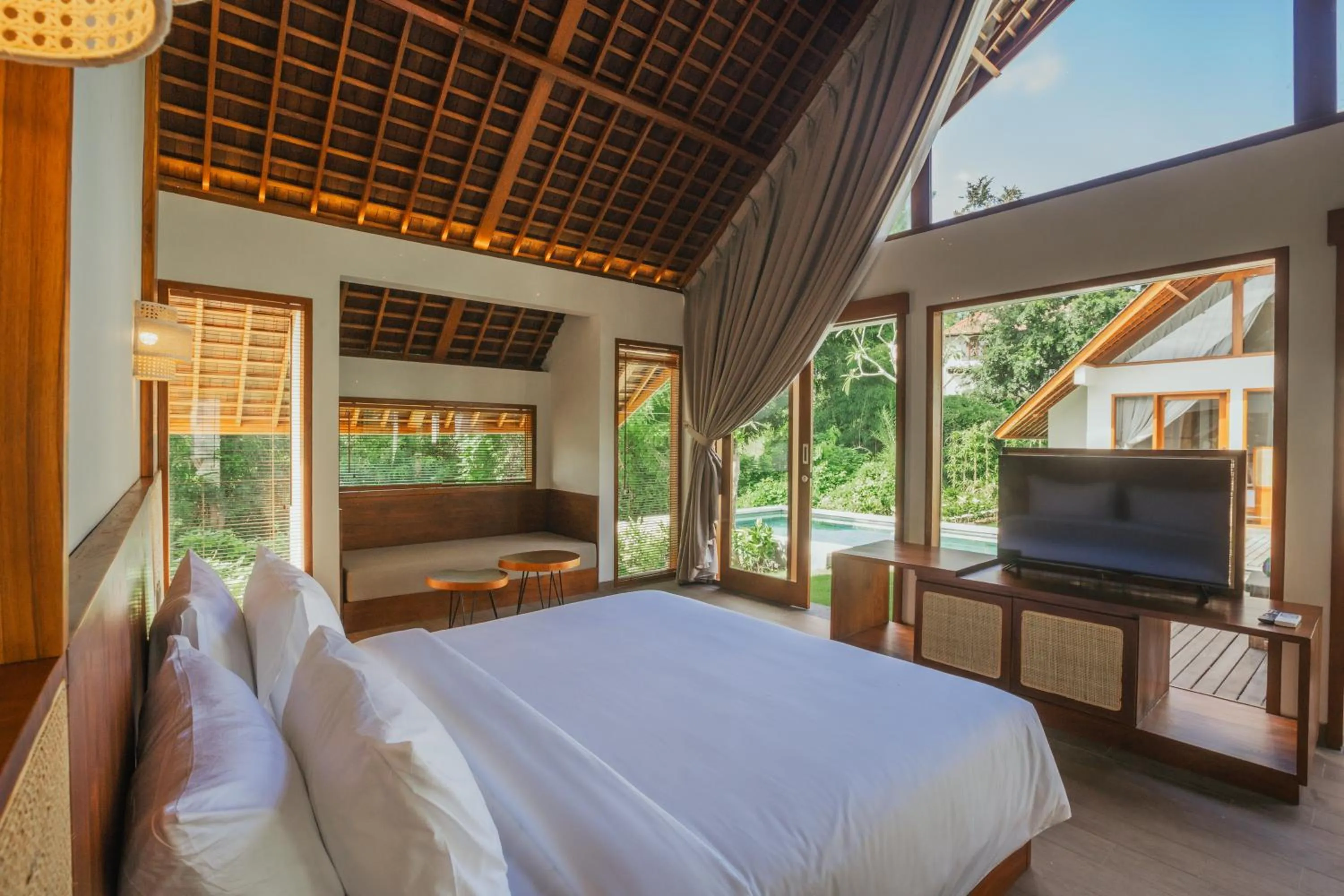 Bed in Arpana Luxury Private Pool Villas