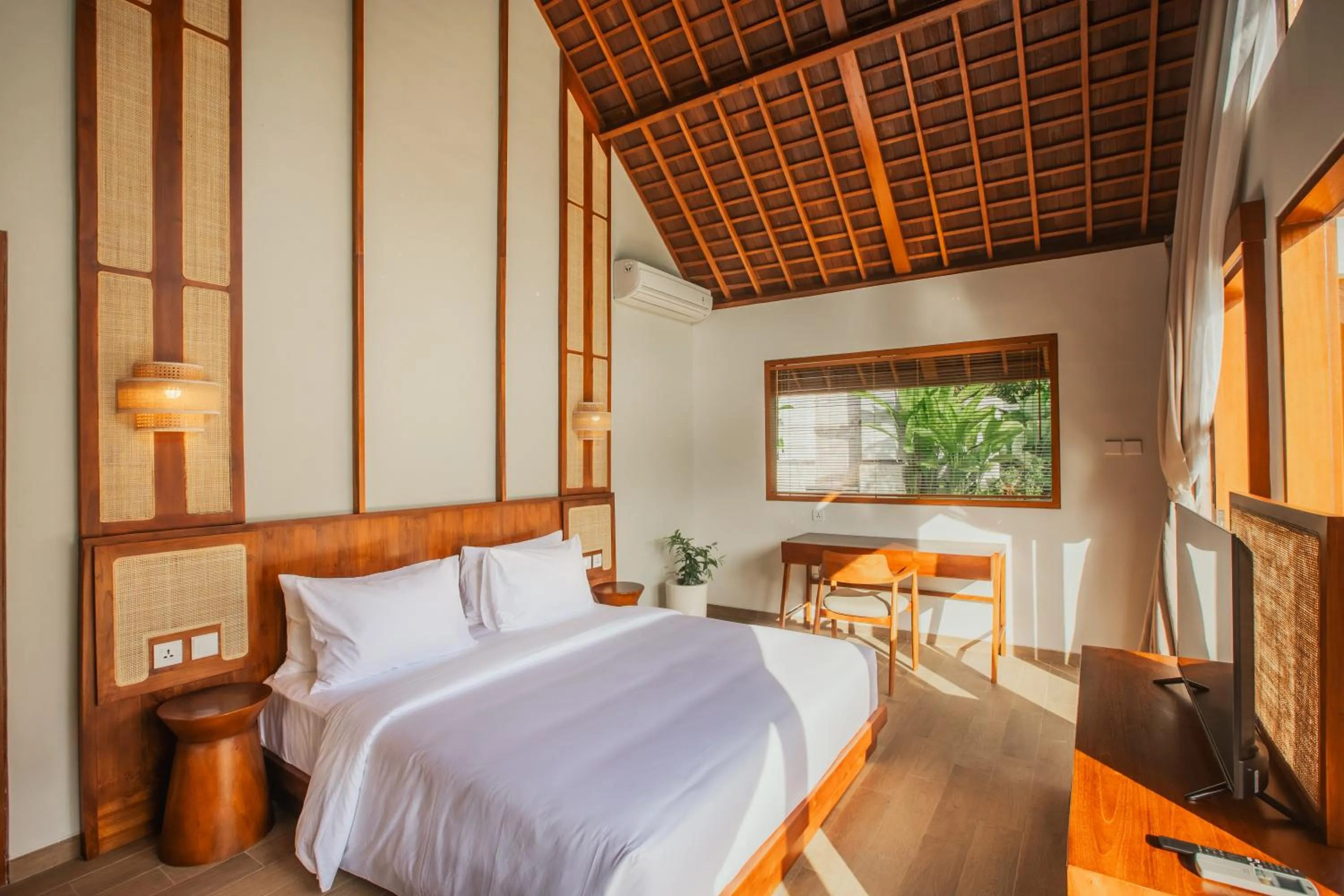 Bed in Arpana Luxury Private Pool Villas