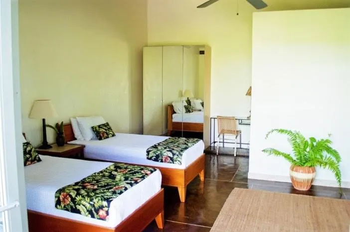 Bed in Almond Tree Hotel Resort