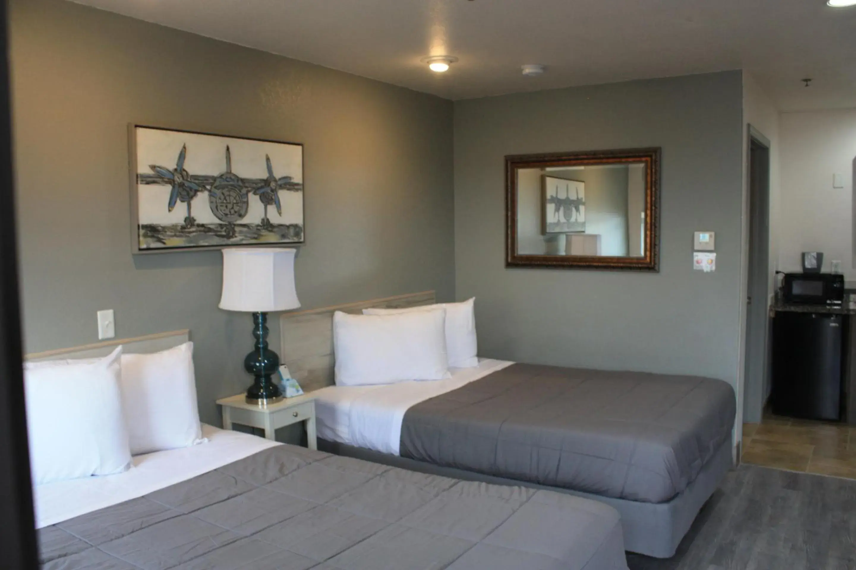 Bedroom in Price Pointe Inn Bedroom in Price Pointe Inn