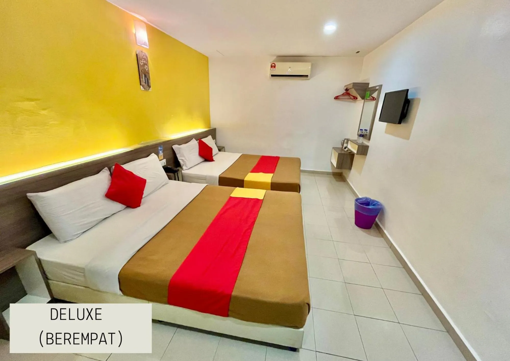 Bed in Yellow Mansion Hotel Melaka Raya