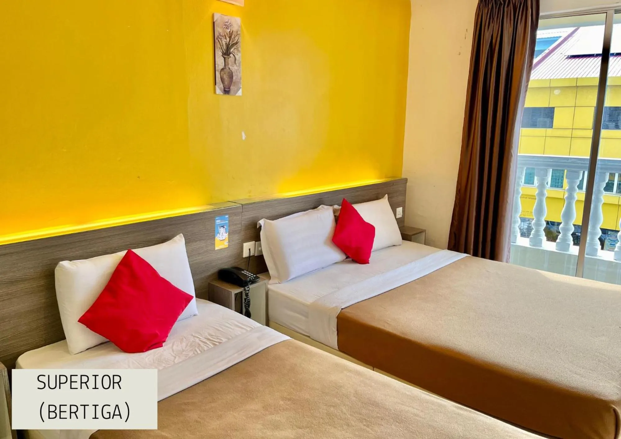 Bed in Yellow Mansion Hotel Melaka Raya