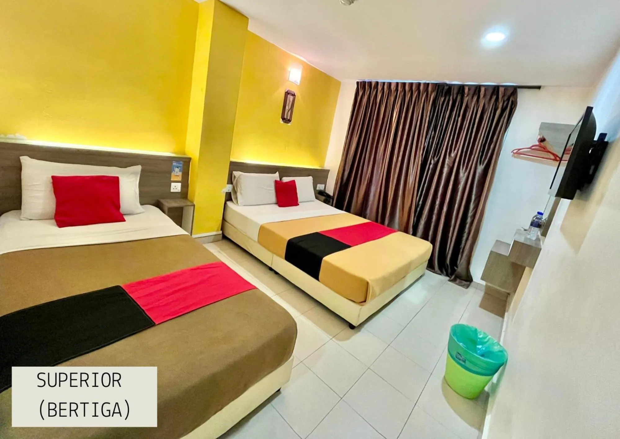 Bed in Yellow Mansion Hotel Melaka Raya