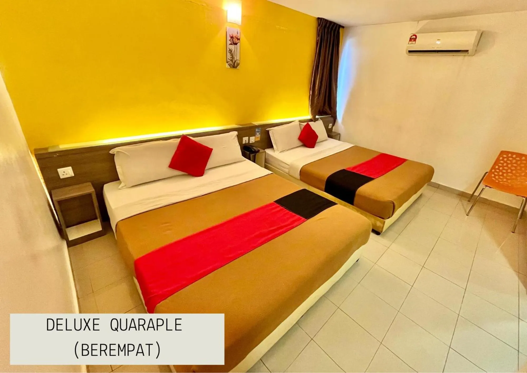 Bed in Yellow Mansion Hotel Melaka Raya