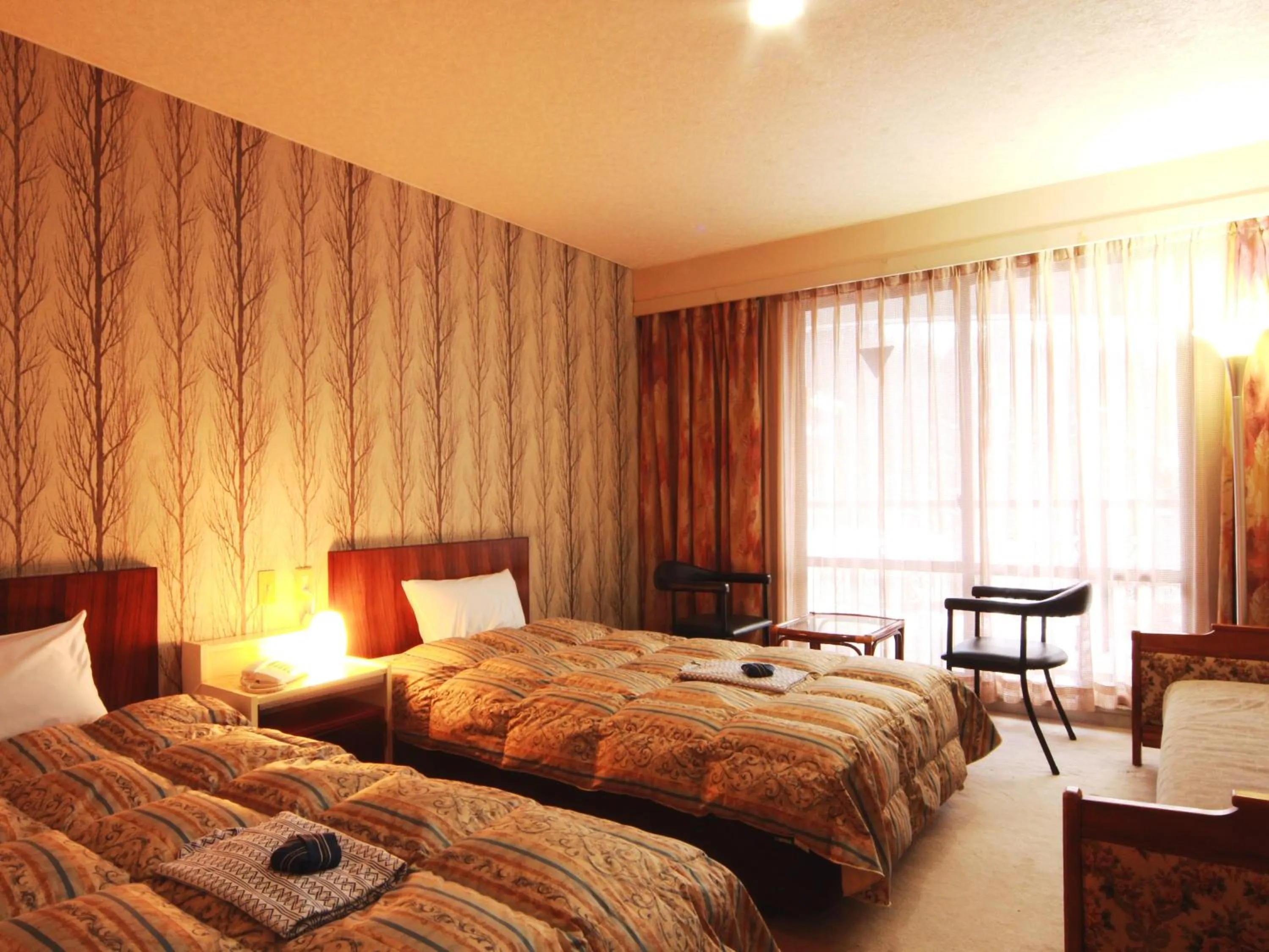 Bed in Hotel Grace Hakuba