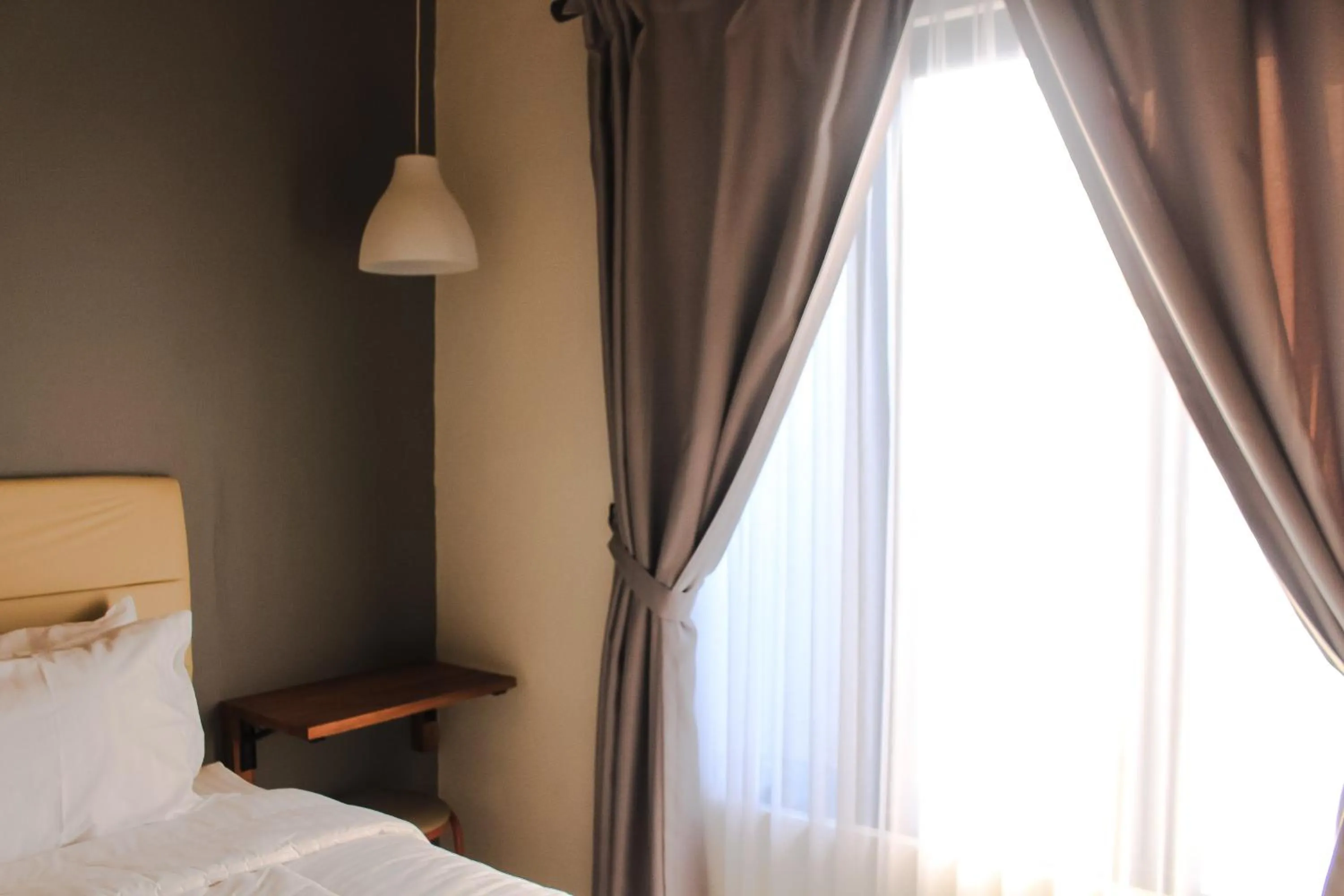 Bed in ELHA Heritage Yogyakarta