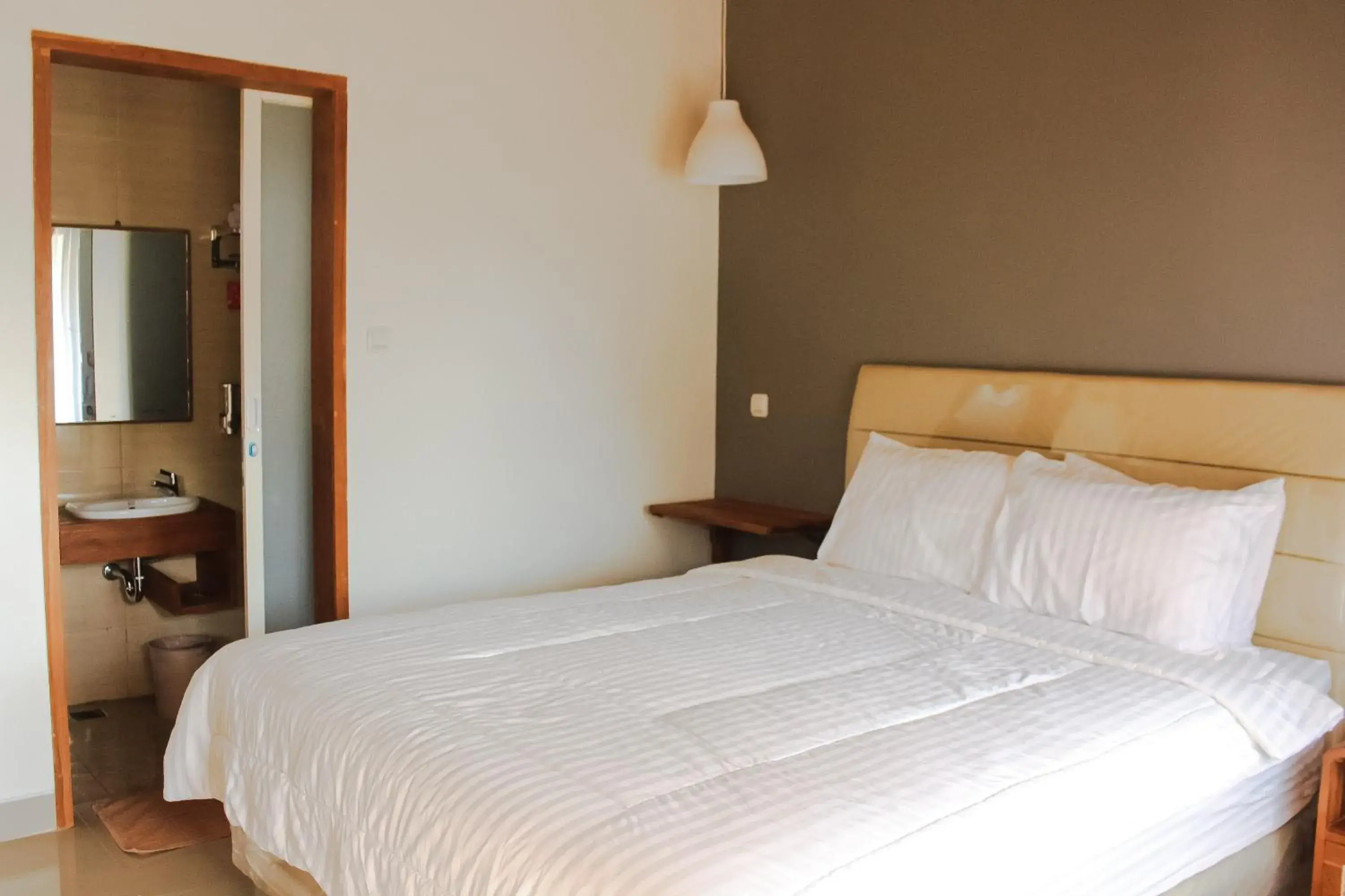 Deluxe Double Room with Balcony in ELHA Heritage Yogyakarta Deluxe Double Room with Balcony in ELHA Heritage Yogyakarta