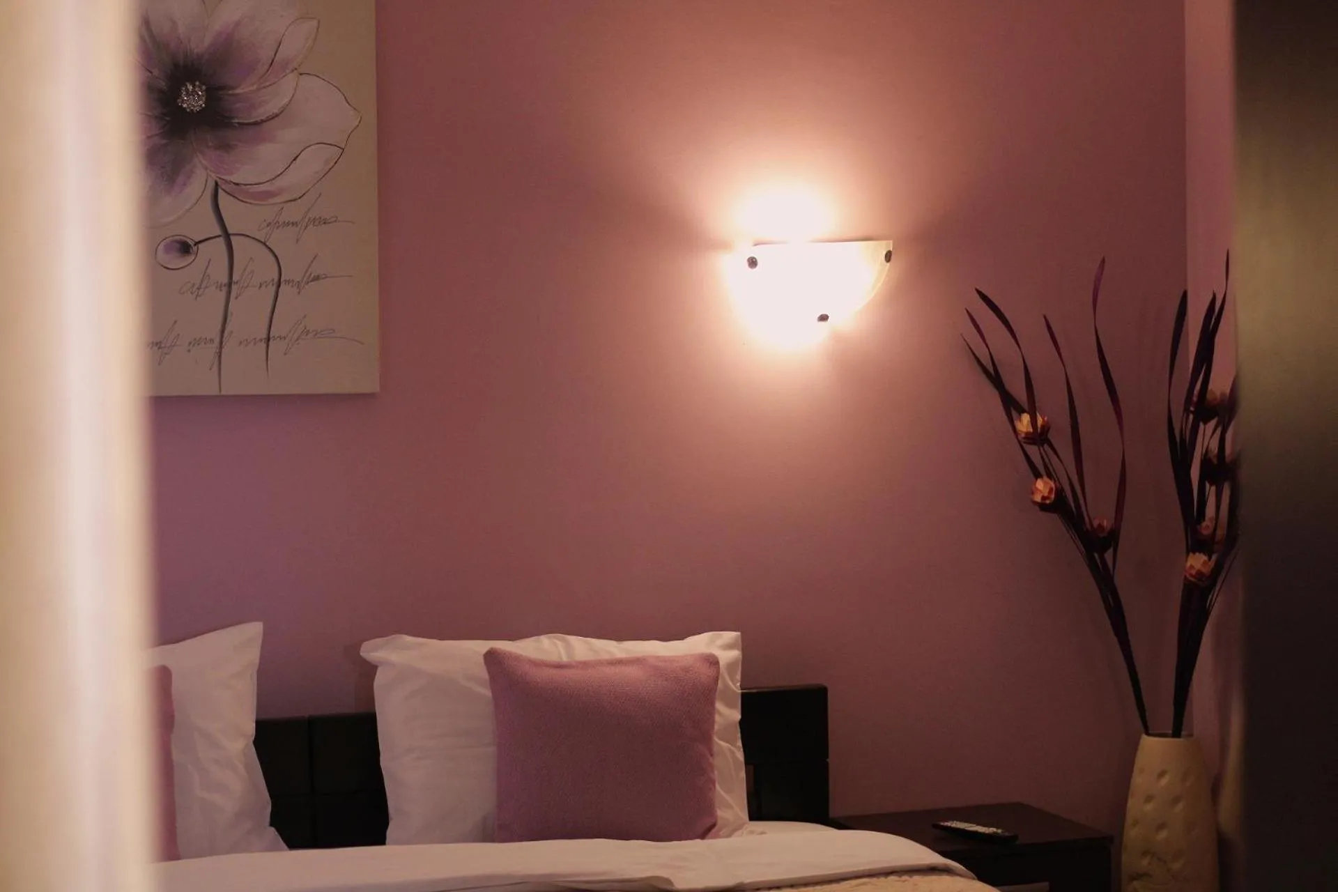 Bed in Apartments Paradisos
