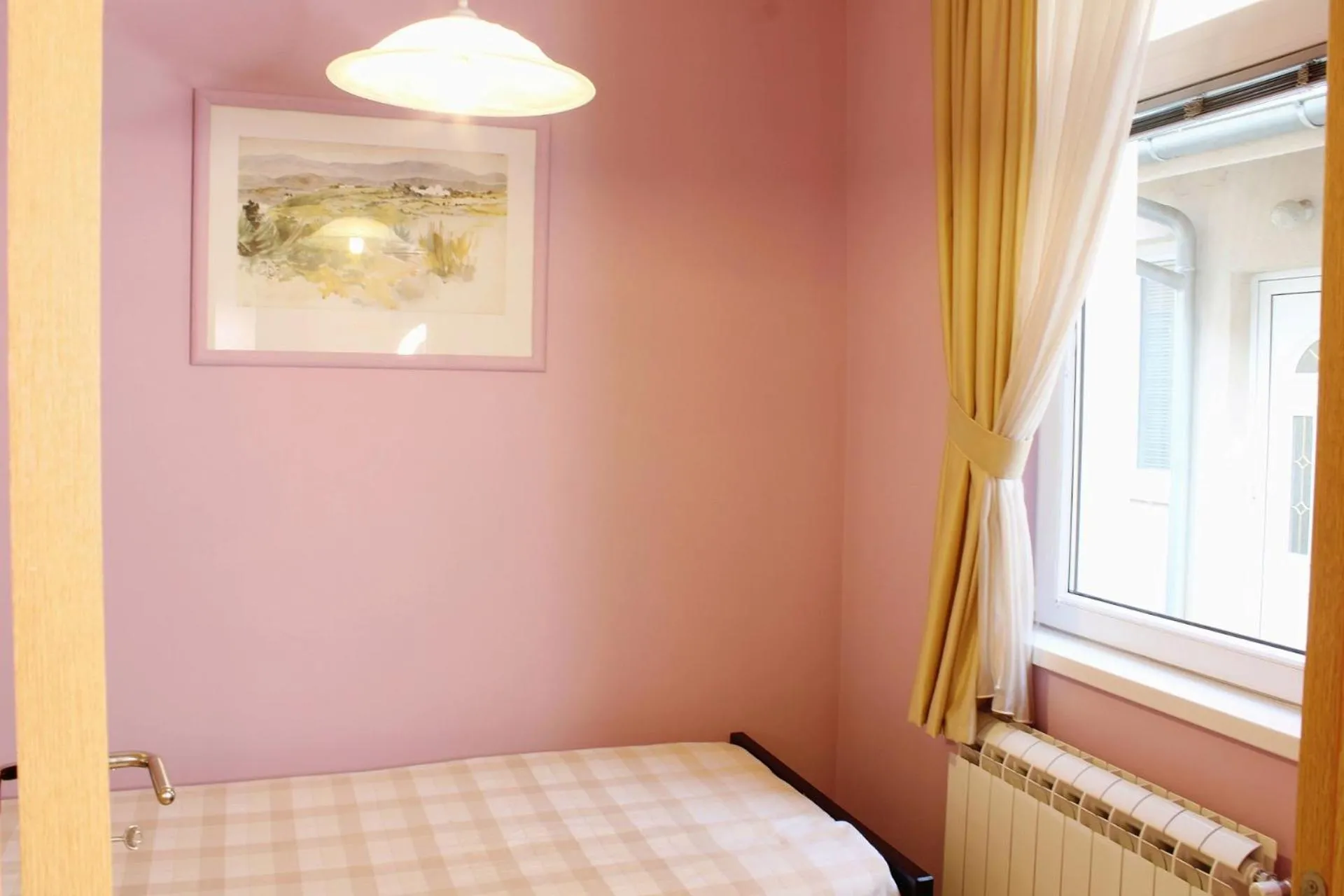 Bed in Apartments Paradisos