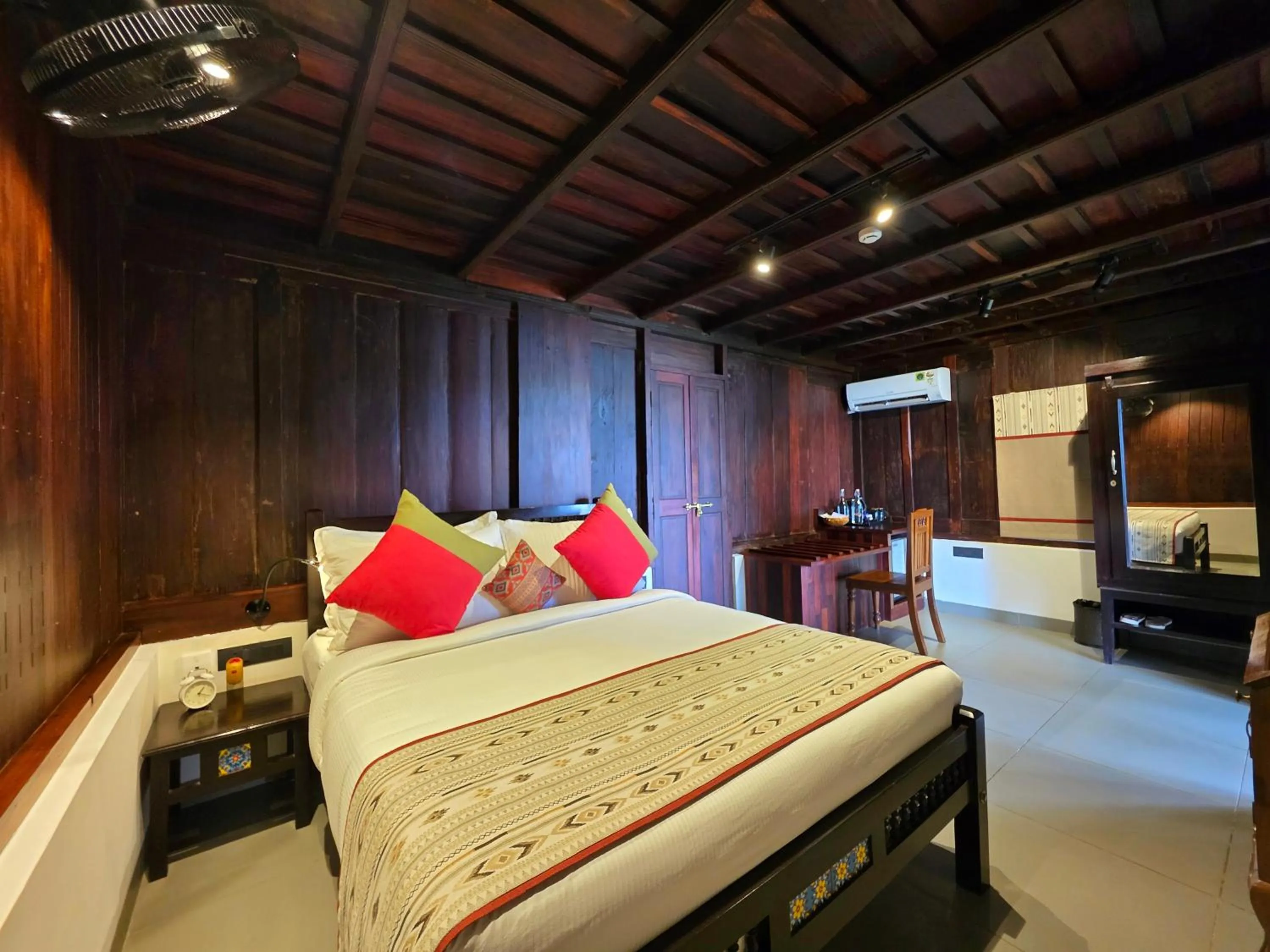 Bed in Vedic Village Retreat Kodungallur