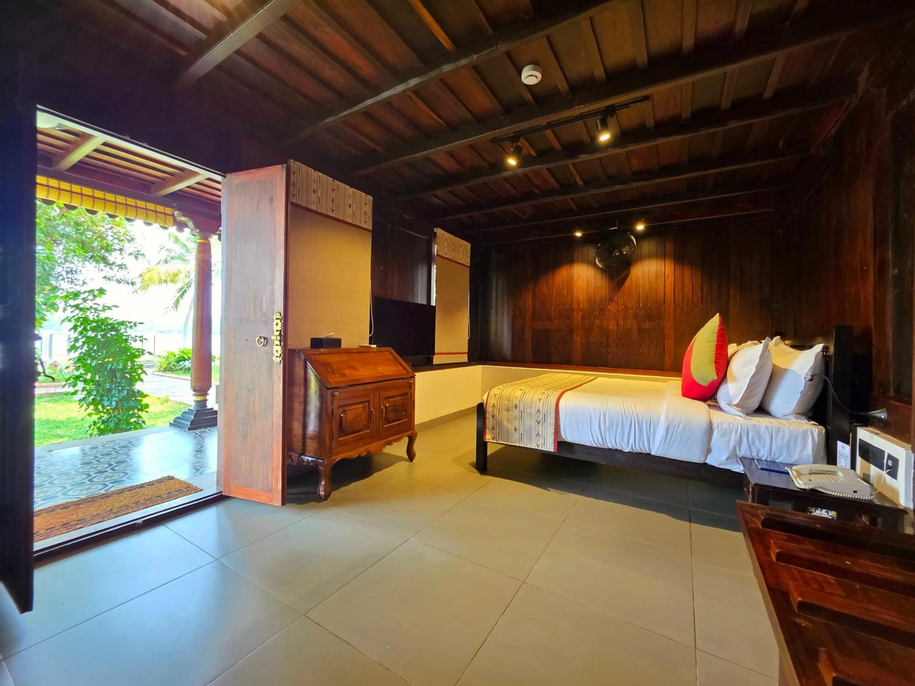 Bed in Vedic Village Retreat Kodungallur