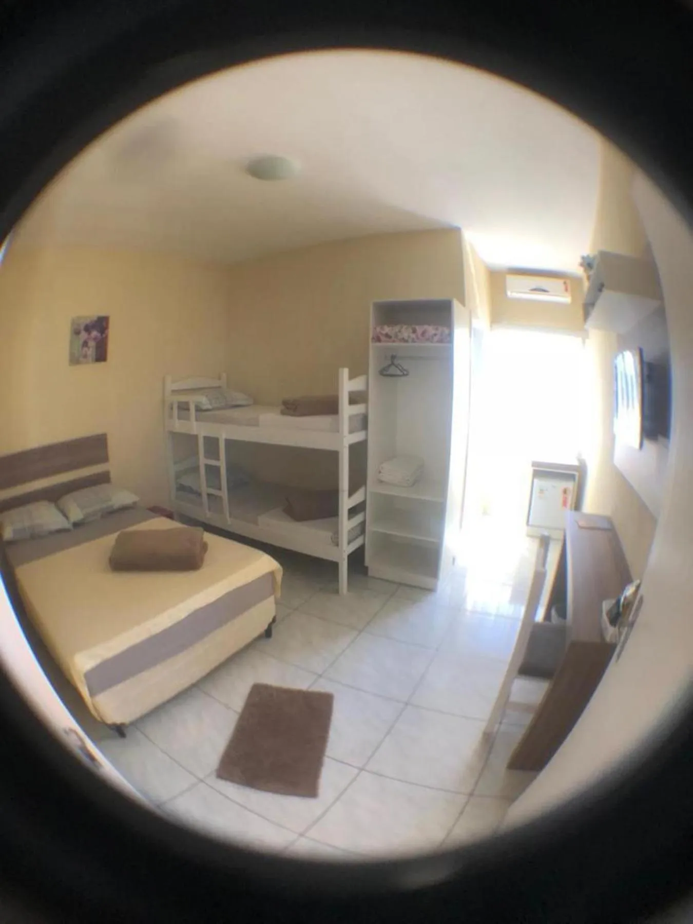 Bed in Pousada Vovó Dilma