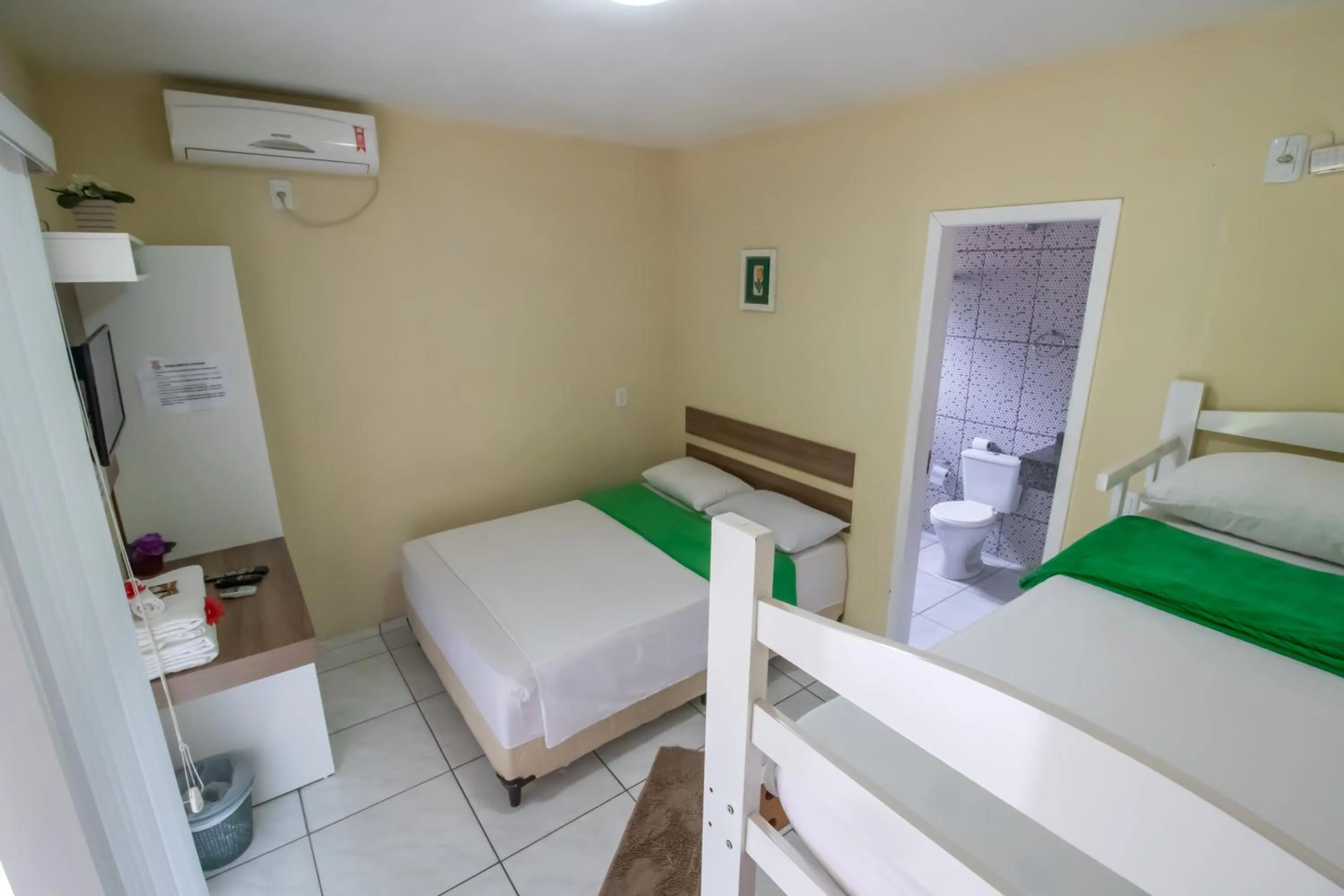 Bed in Pousada Vovó Dilma