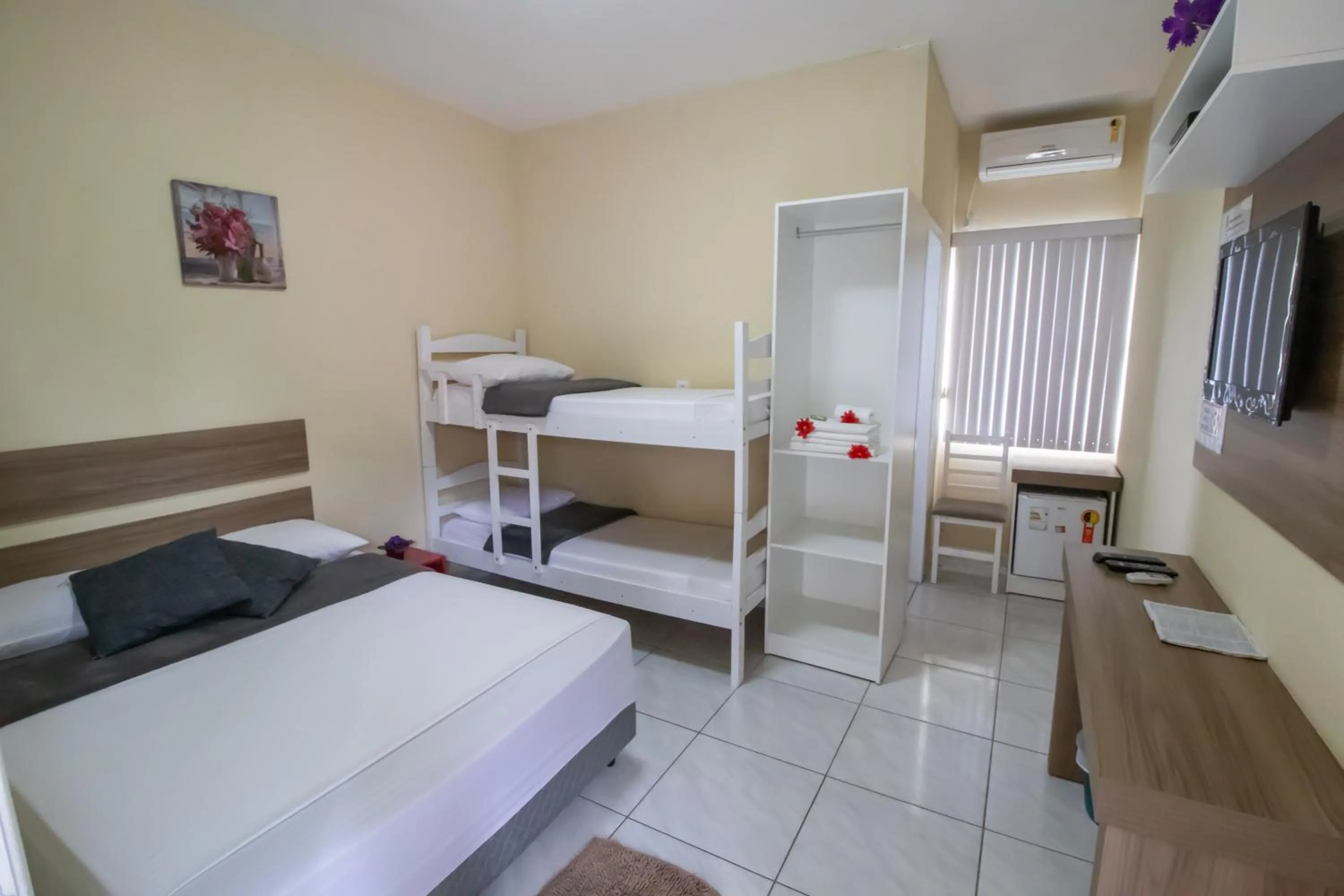 Bed in Pousada Vovó Dilma