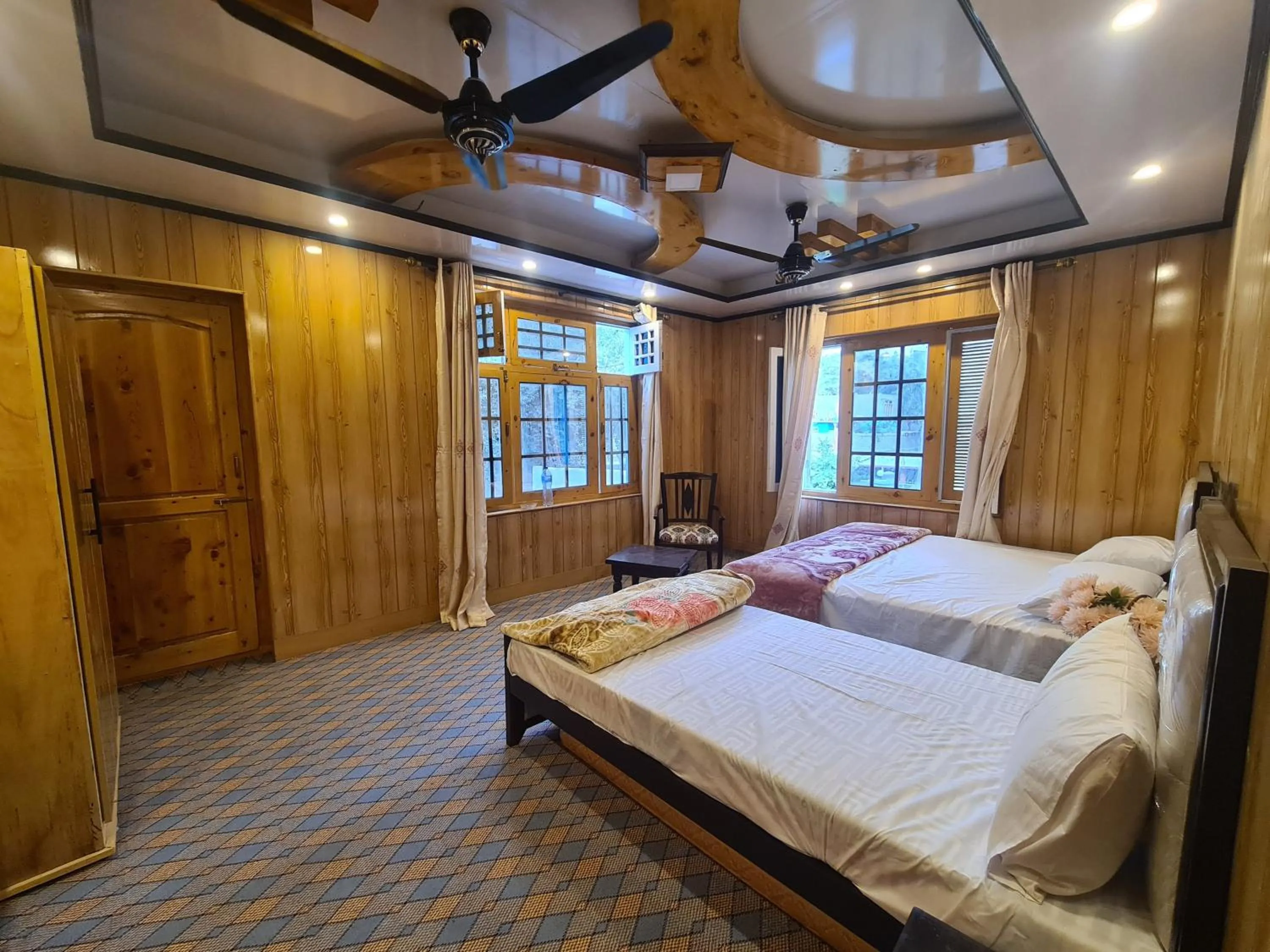 Bed in Rus Olive Lodge Skardu