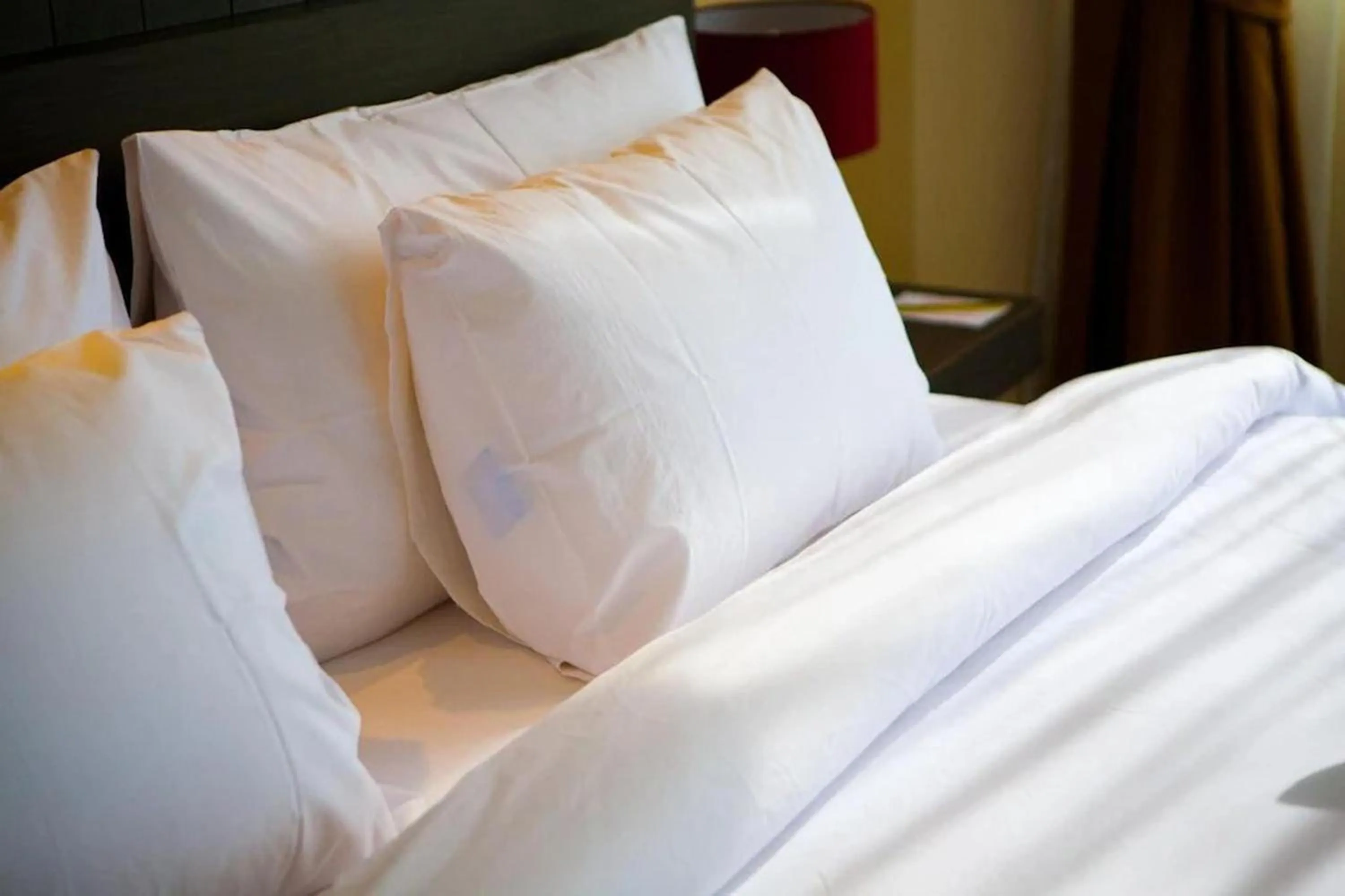 Bed in Suncity Hotel Pattaya